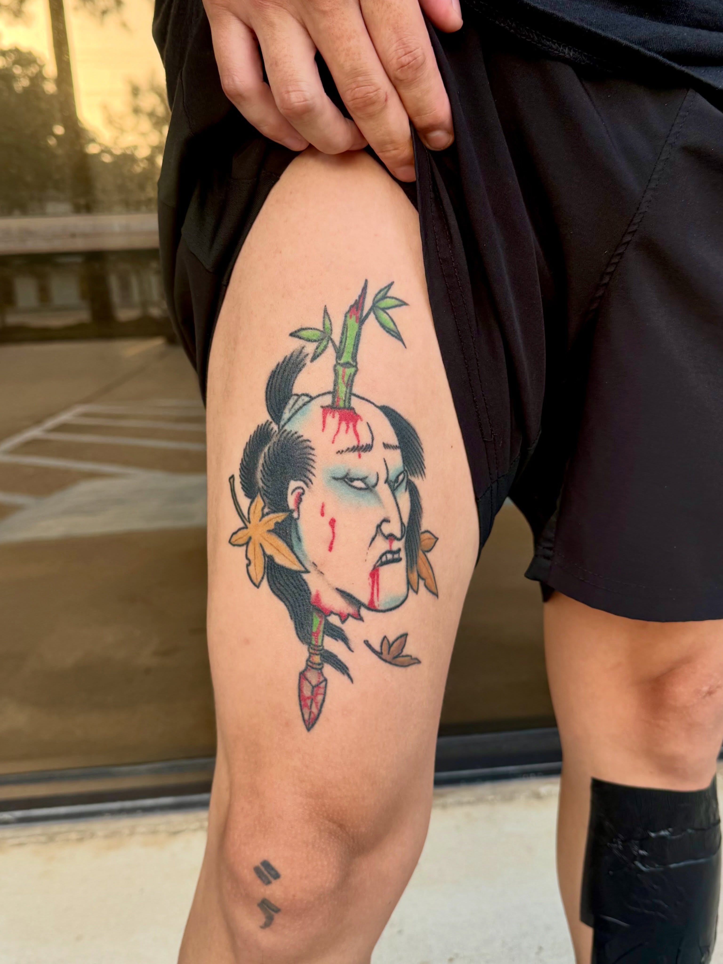 Japanese warrior head American traditional tattoo on the thigh by Shay - Mandeville Tattoo Artist