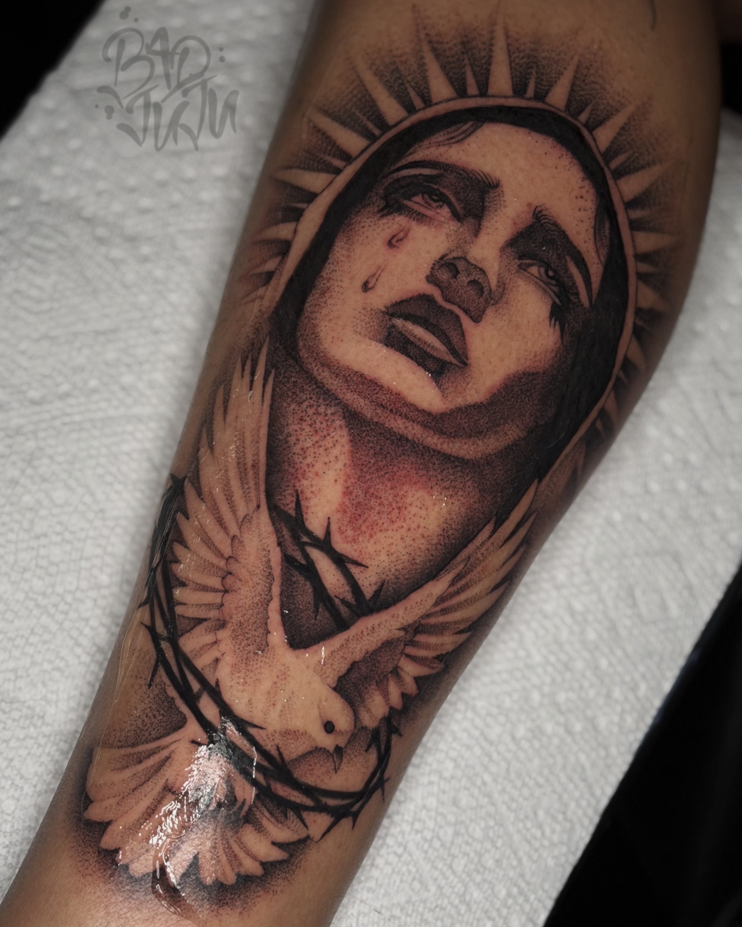 Religious figure with dove dotwork tattoo on the forearm by 💞Juju💕