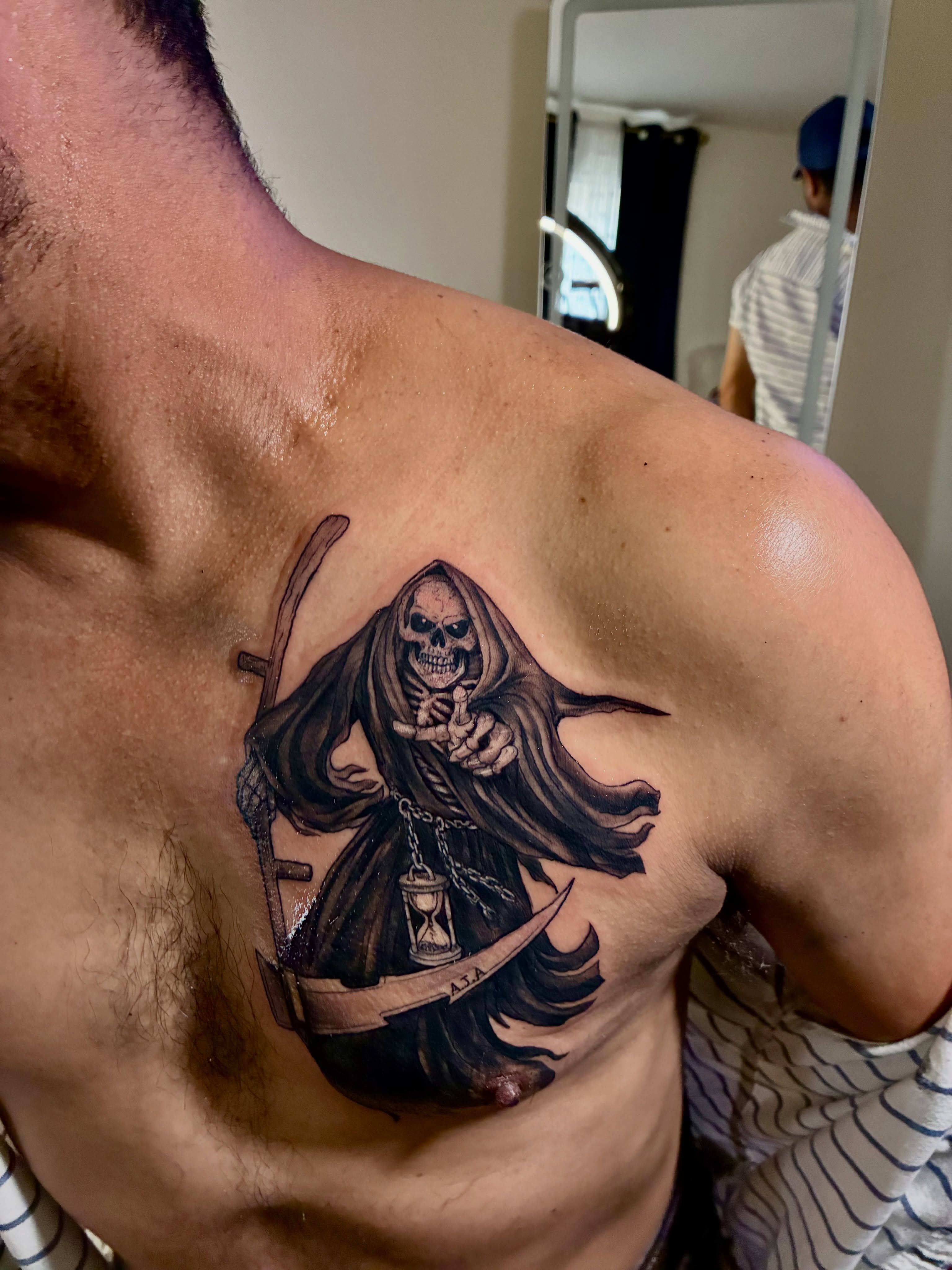 Reaper with hourglass dark realism tattoo on the chest by ๐ต๐๐๐๐๐๐๐ ๐ป๐๐๐๐
