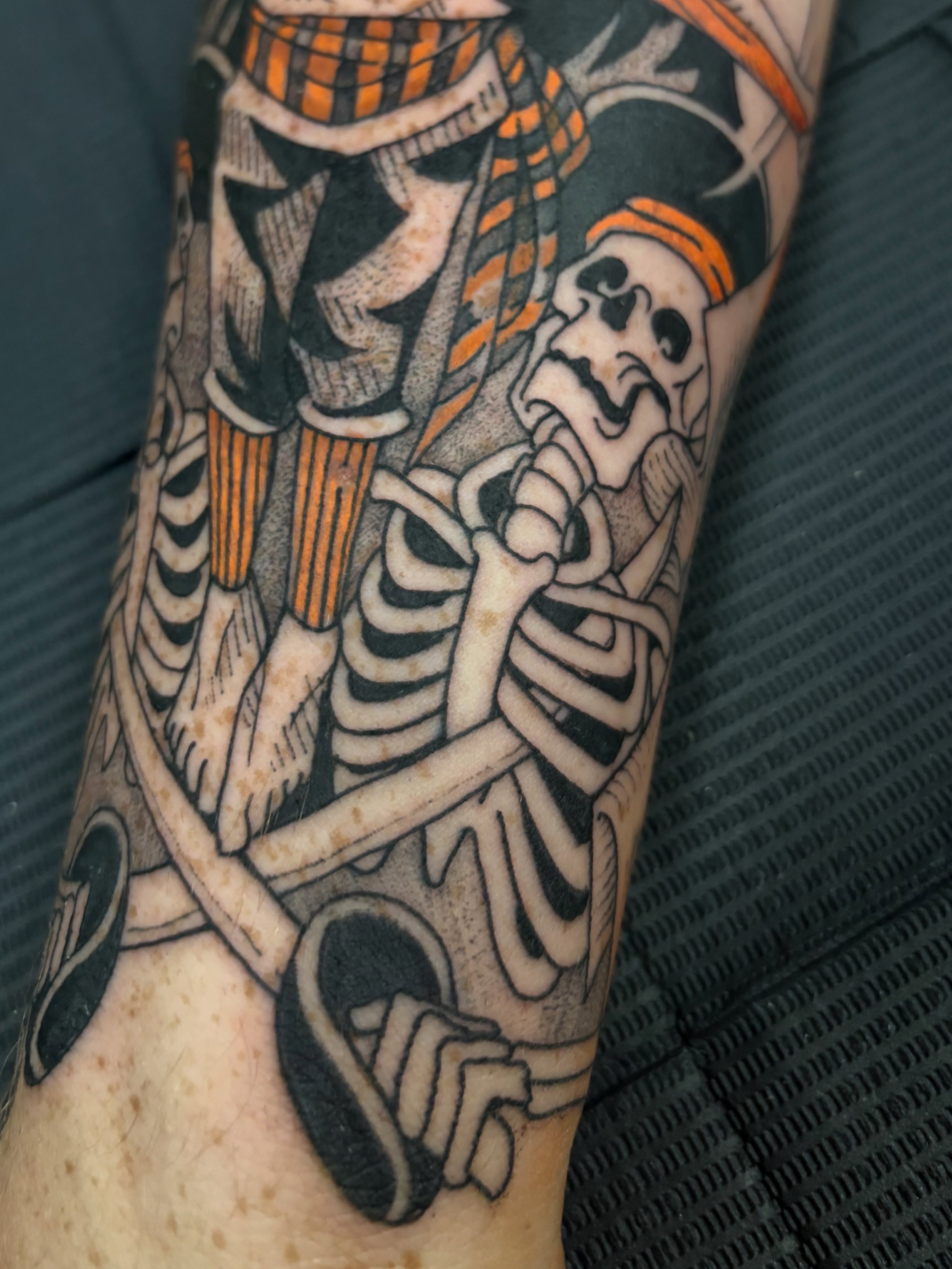 Skeletons American traditional tattoo on the forearm by ๐๐๐ฏ๐ฌ๐ซ ๐๐ก๐ก๐๐ช๐ฐ