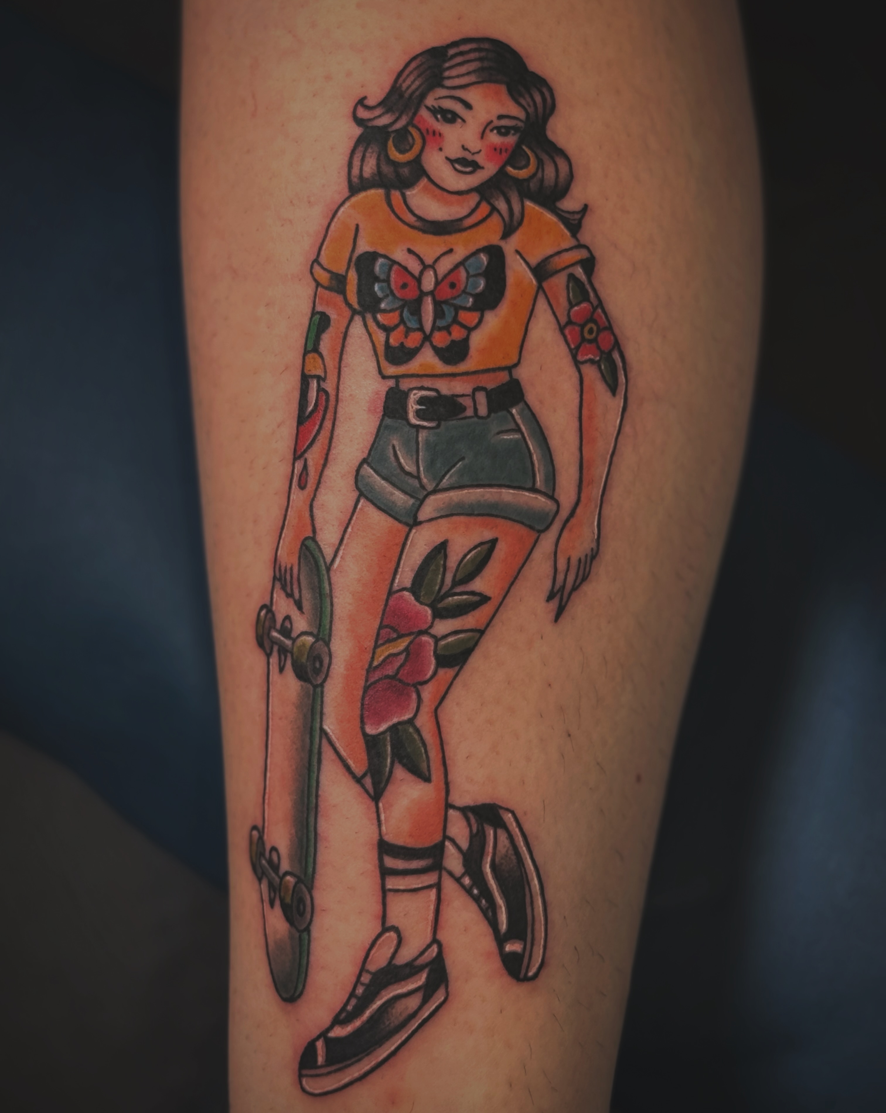 Skateboarding girl American traditional tattoo on the forearm by Kaylee Castleton, Tooele, Utah