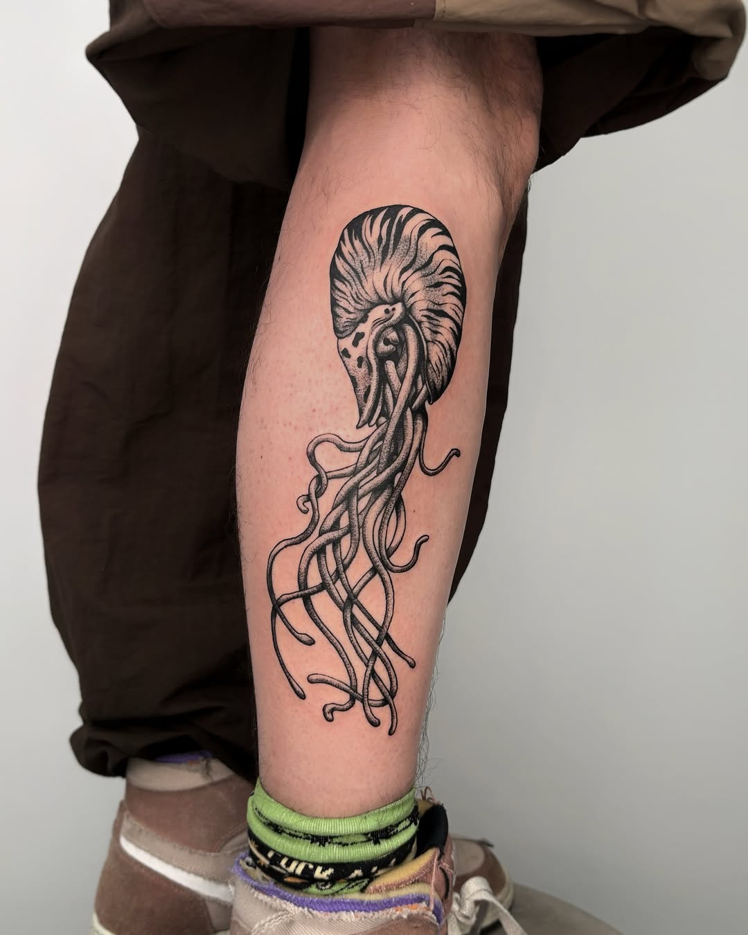 Jellyfish black and grey tattoo on the calf by Kuya, Berkeley, California