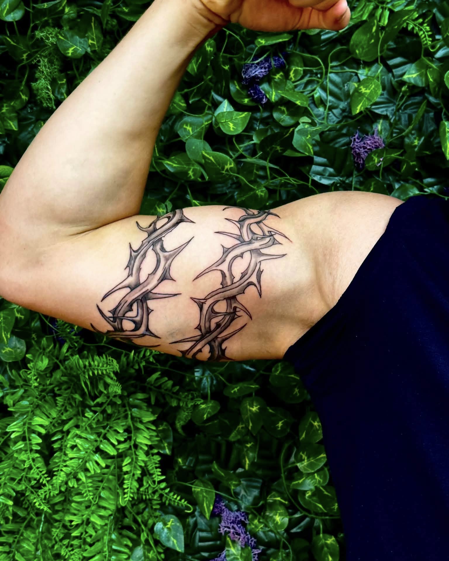 Thorn crown black and grey tattoo on the forearm by Sabrina