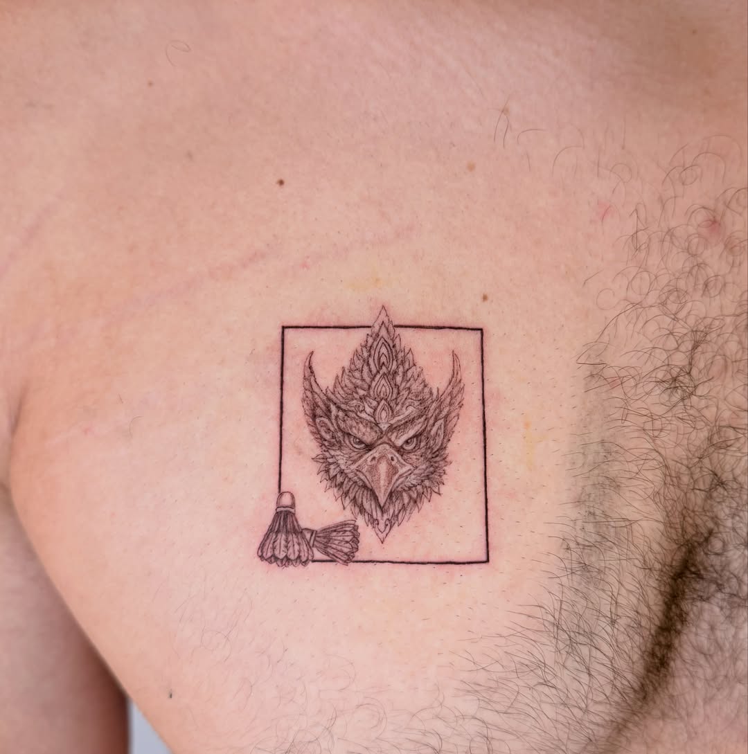 Owl and shuttlecock black and grey tattoo on the chest by Yuri Chloe Ngo Tattoo Artist
