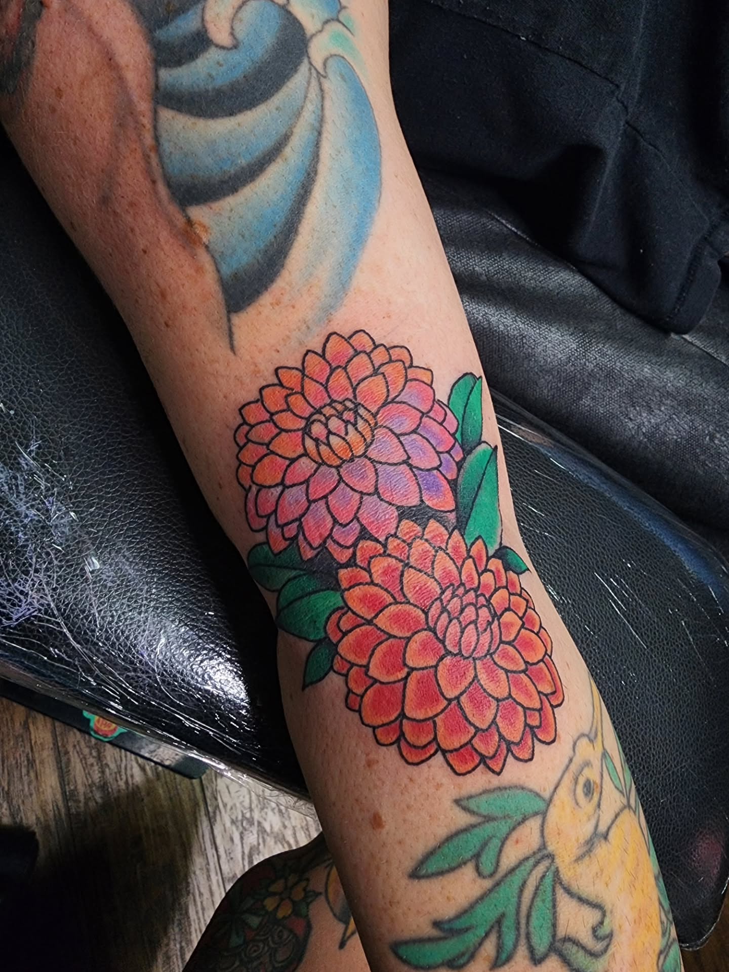 Chrysanthemums new school tattoo on the forearm by Meggalodon 🖤 (Meggan Rose)