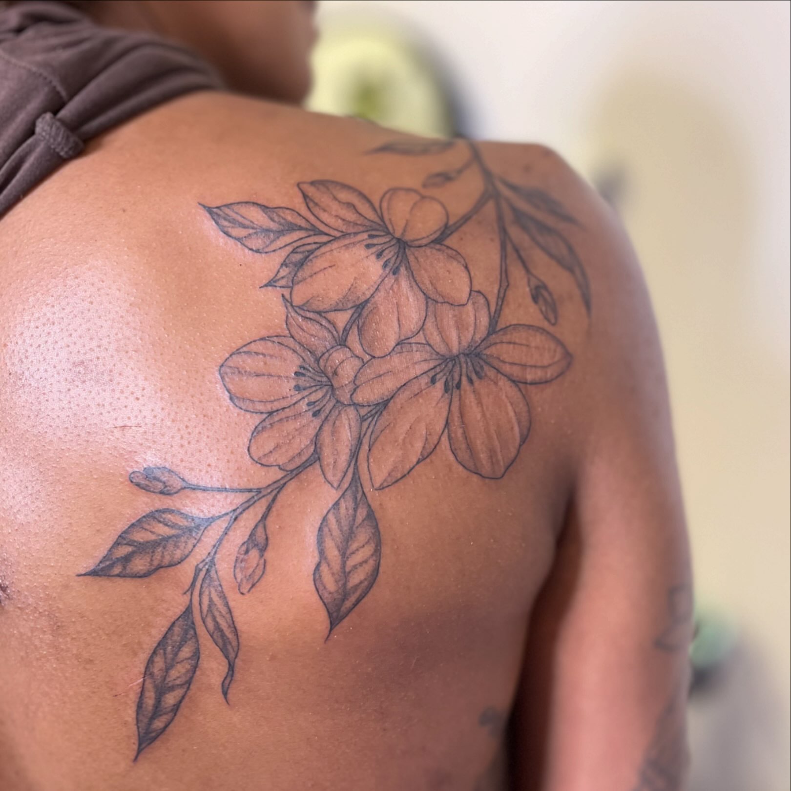 Flower bouquet black and grey tattoo on the shoulder by 🌼DaisyDaiz🕸️