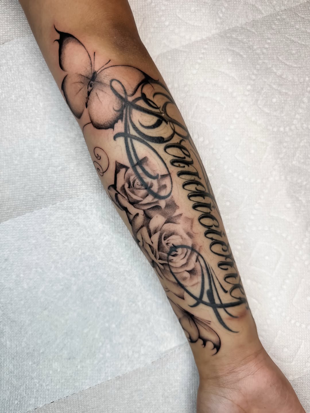 Tattoo by @ryleecooktattoo — lettering_script, black_and_grey