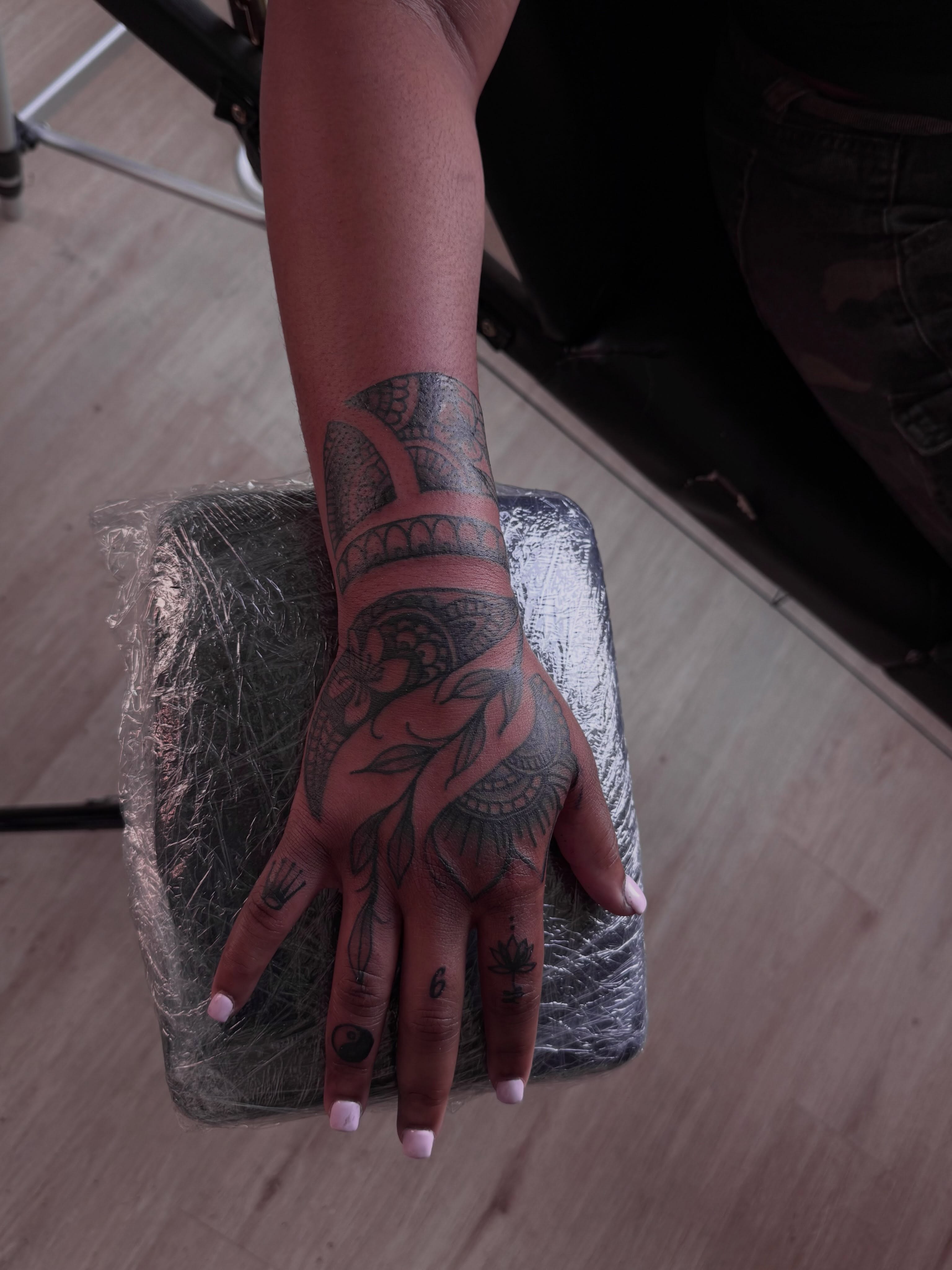 Floral design ornamental tattoo on the hand by inkedbylii, Philadelphia, Pennsylvania