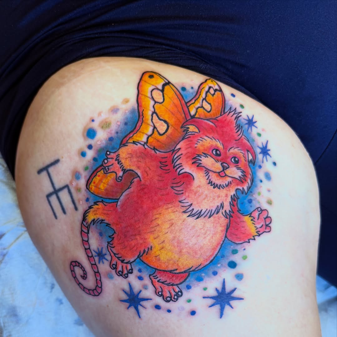 Cat watercolor tattoo on the thigh by Aidan Monahan Tattoo
