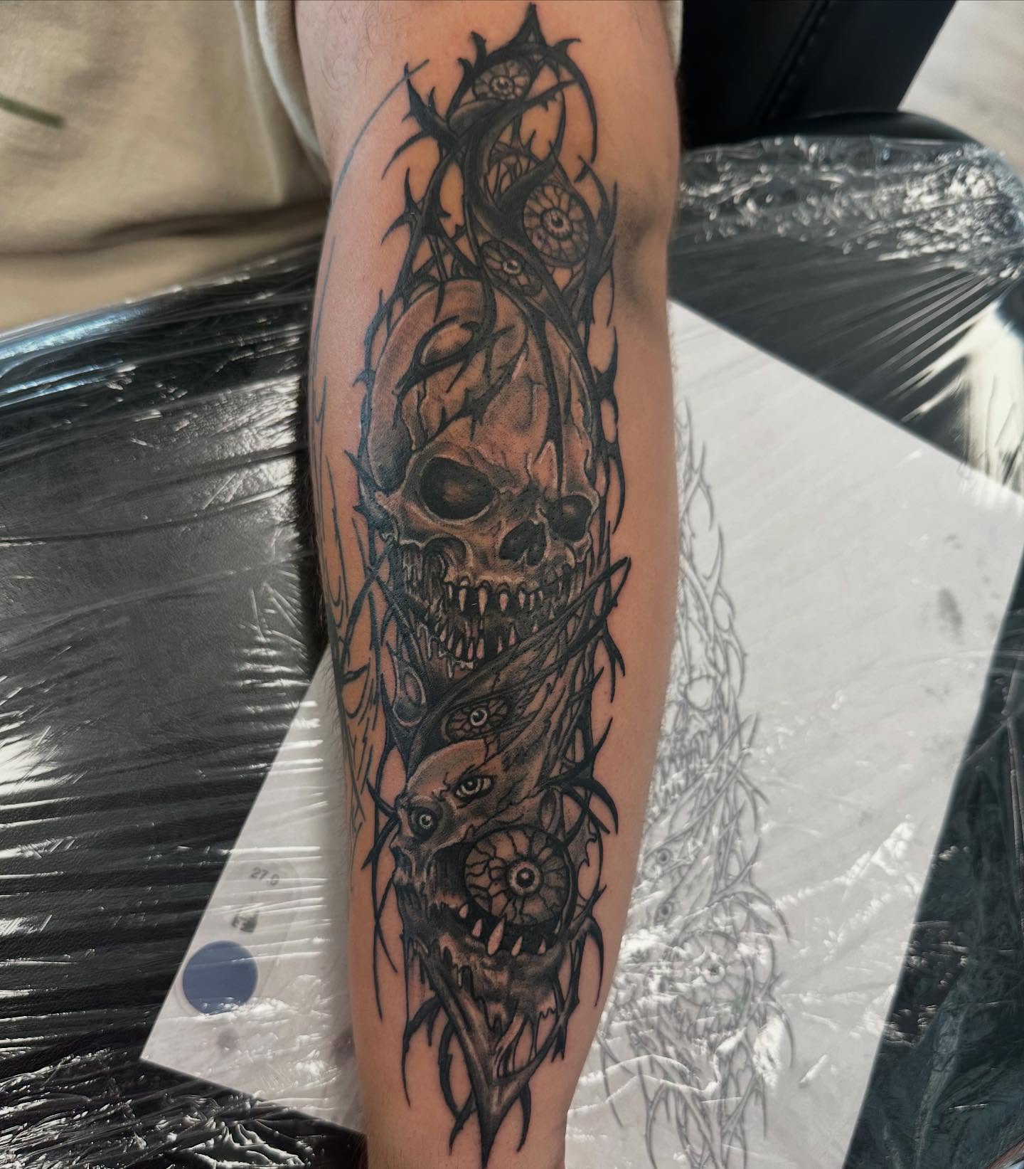 Tattoo by @dsteal03 — black_and_grey, dark_realism