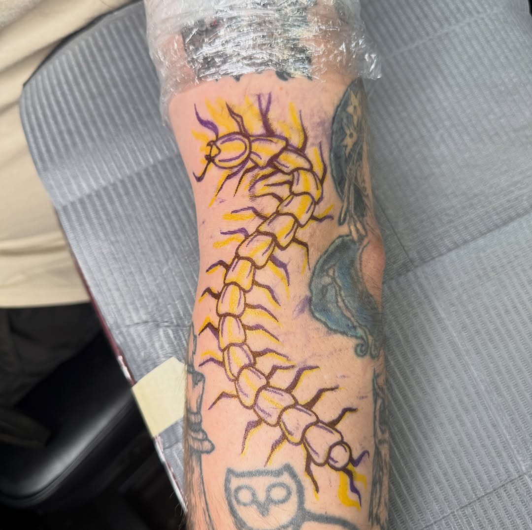 Spine American traditional tattoo on the forearm by Savannah Duff