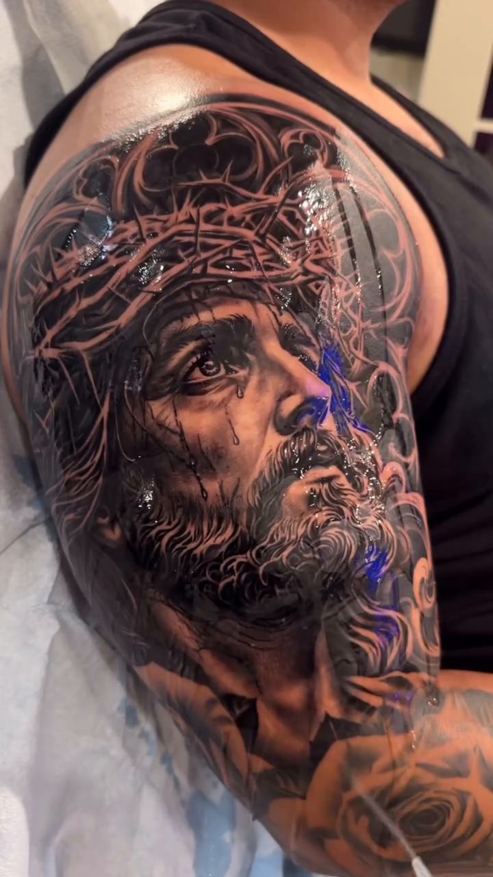Jesus Christ realism tattoo by 𝐉𝐨𝐧 𝐒𝐚𝐧𝐭𝐨𝐬