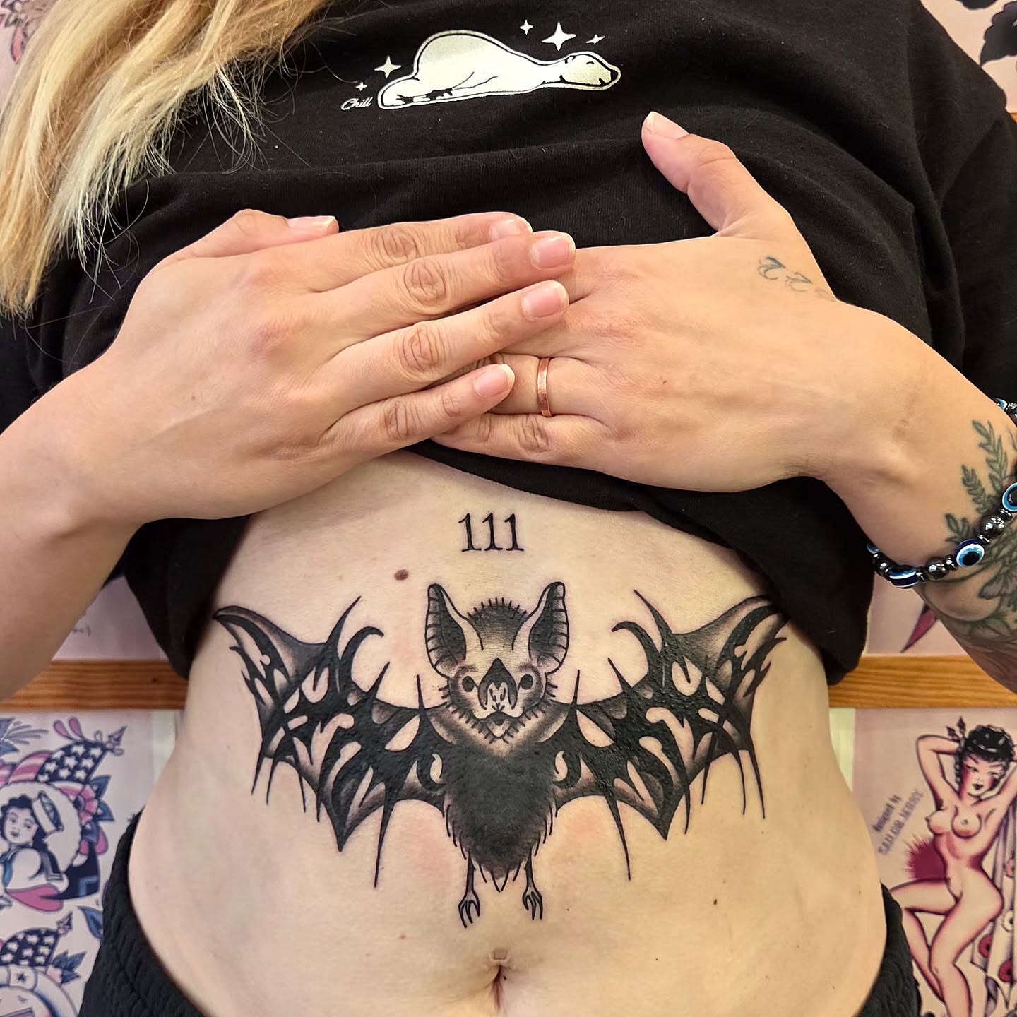 Bat black and grey tattoo on the torso by Kat Coniglio Art