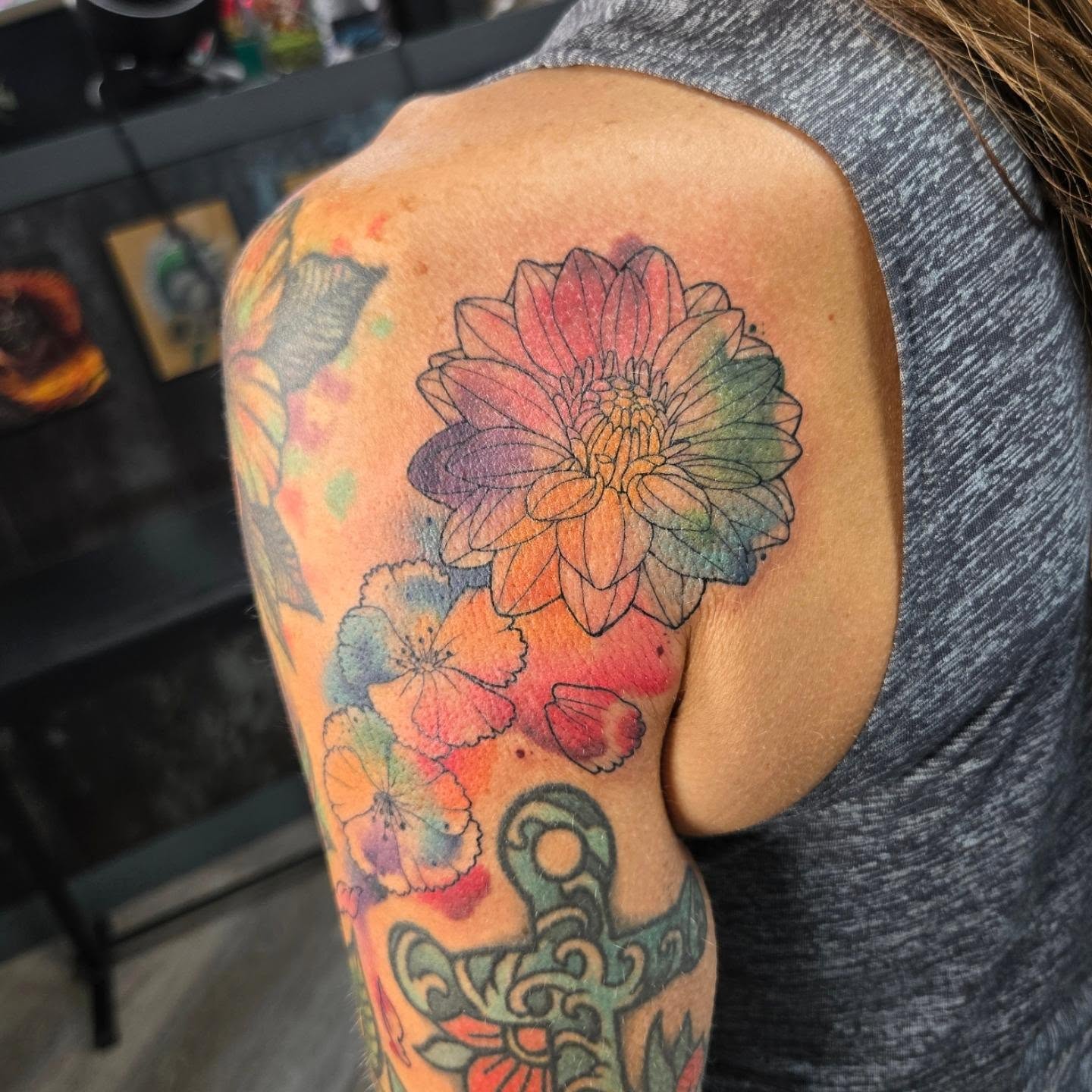 Flower bouquet watercolor tattoo on the shoulder by Britty Love, Nashville, Tennessee