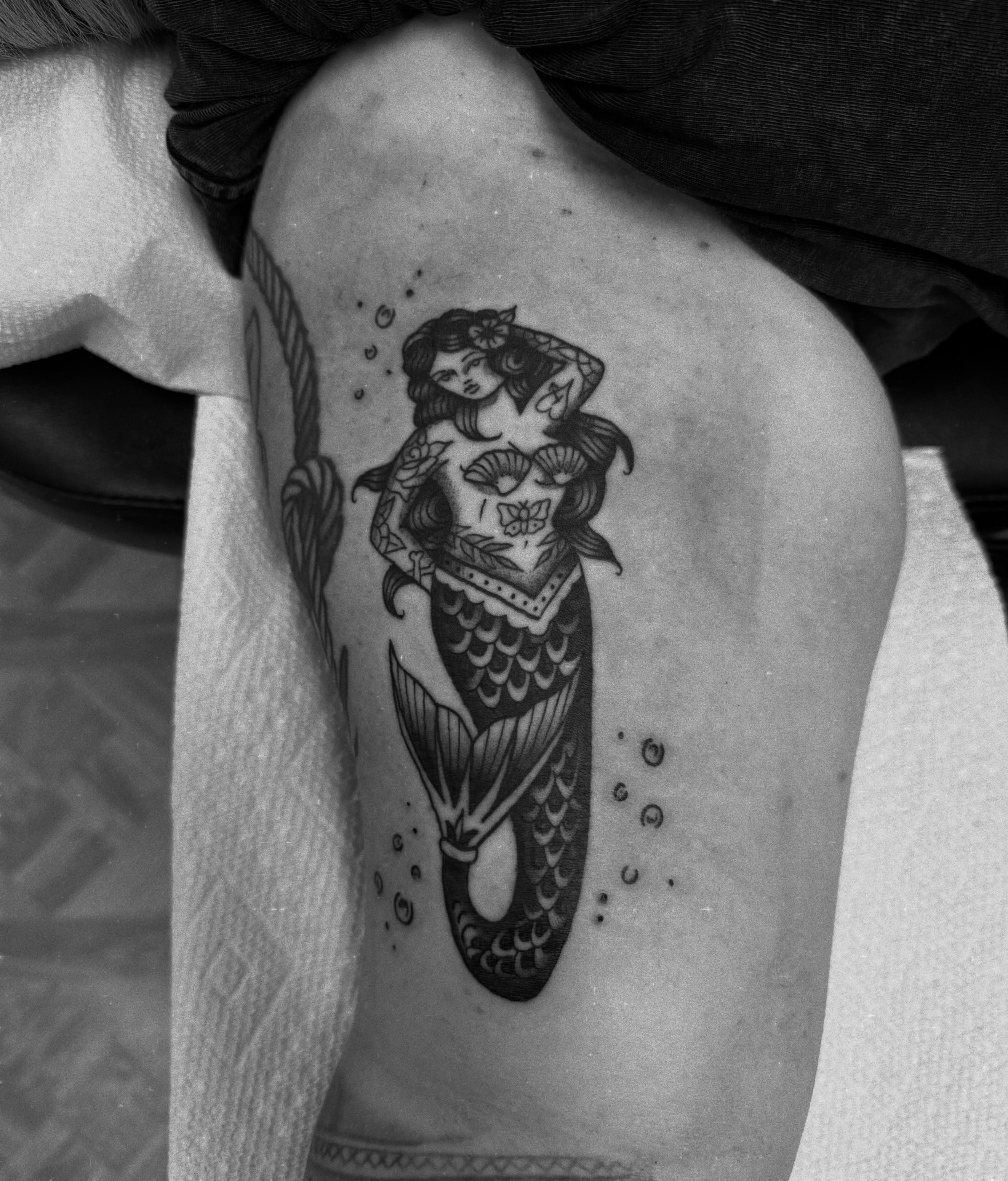 Mermaid American traditional tattoo on the shoulder by Emmie Turner