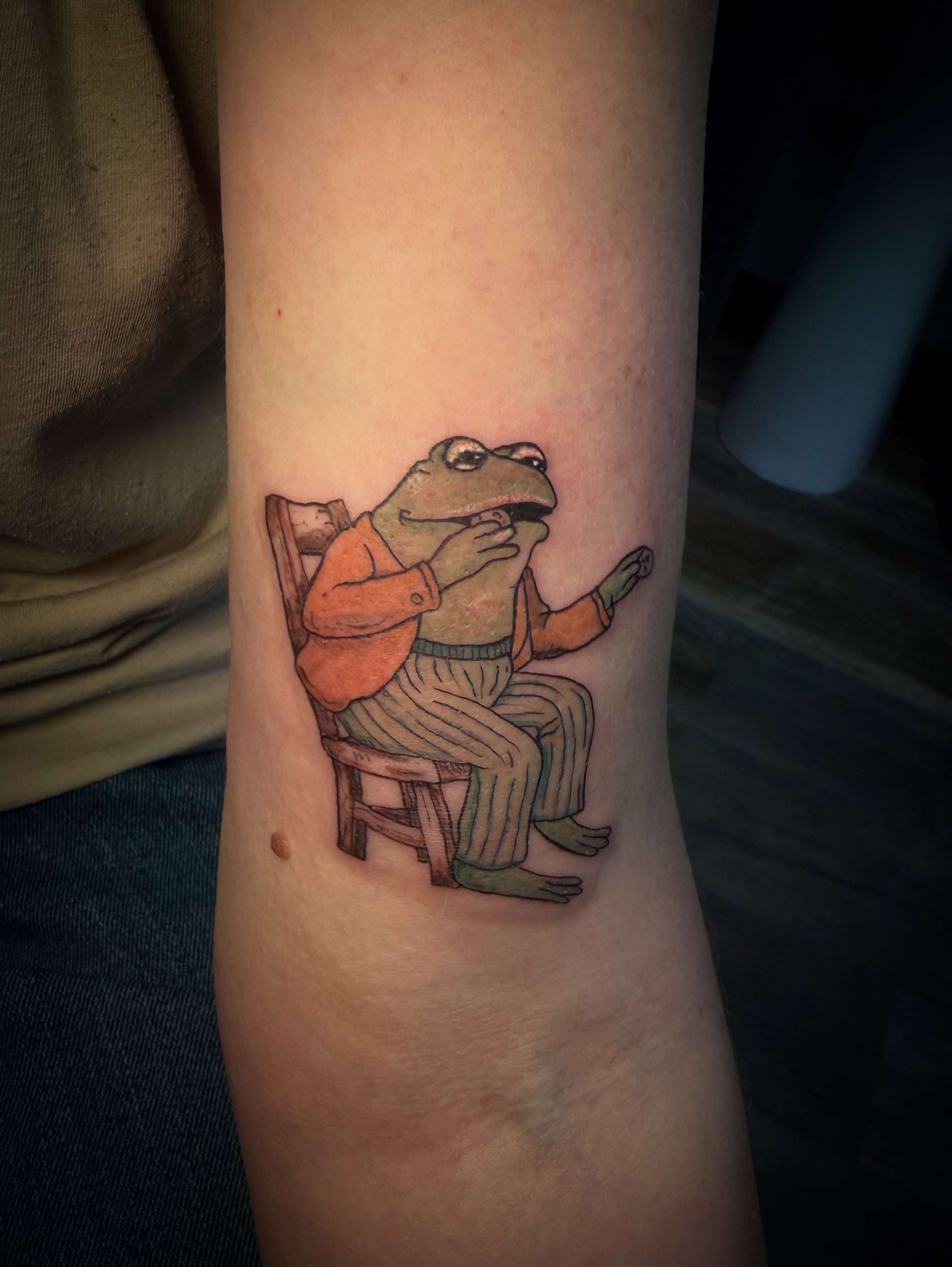 Frogs realism tattoo on the forearm by Rachel Hanke