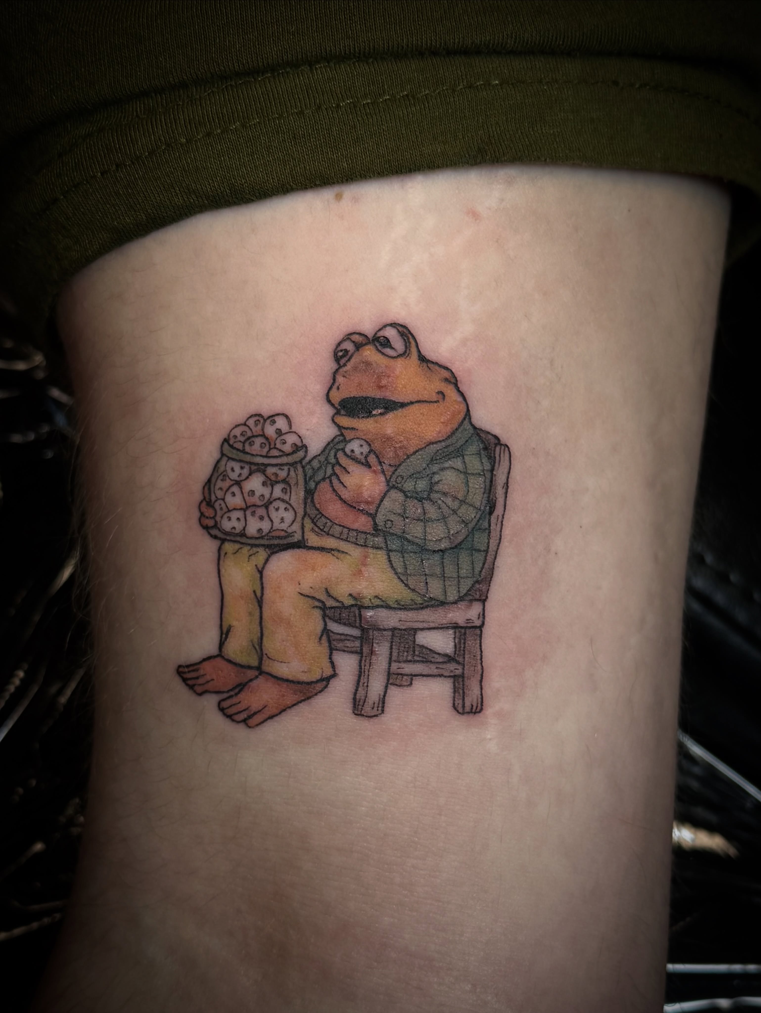Frog character realism tattoo on the forearm by Rachel Hanke
