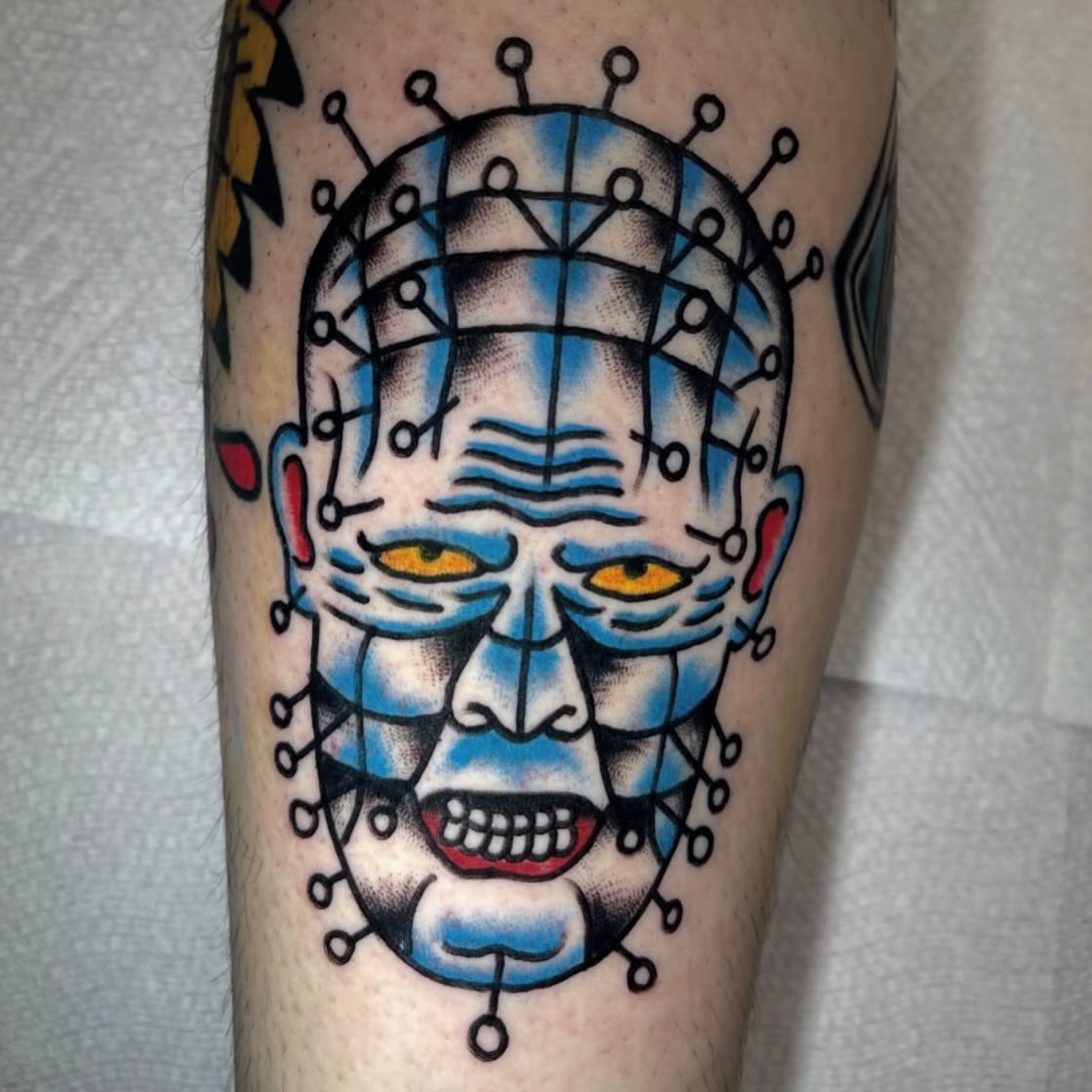 Pinhead American traditional tattoo on the forearm by Don Lee