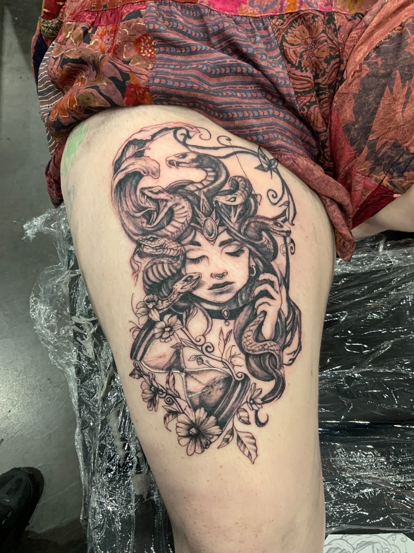 Medusa realism tattoo on the thigh by Daniel Illachek