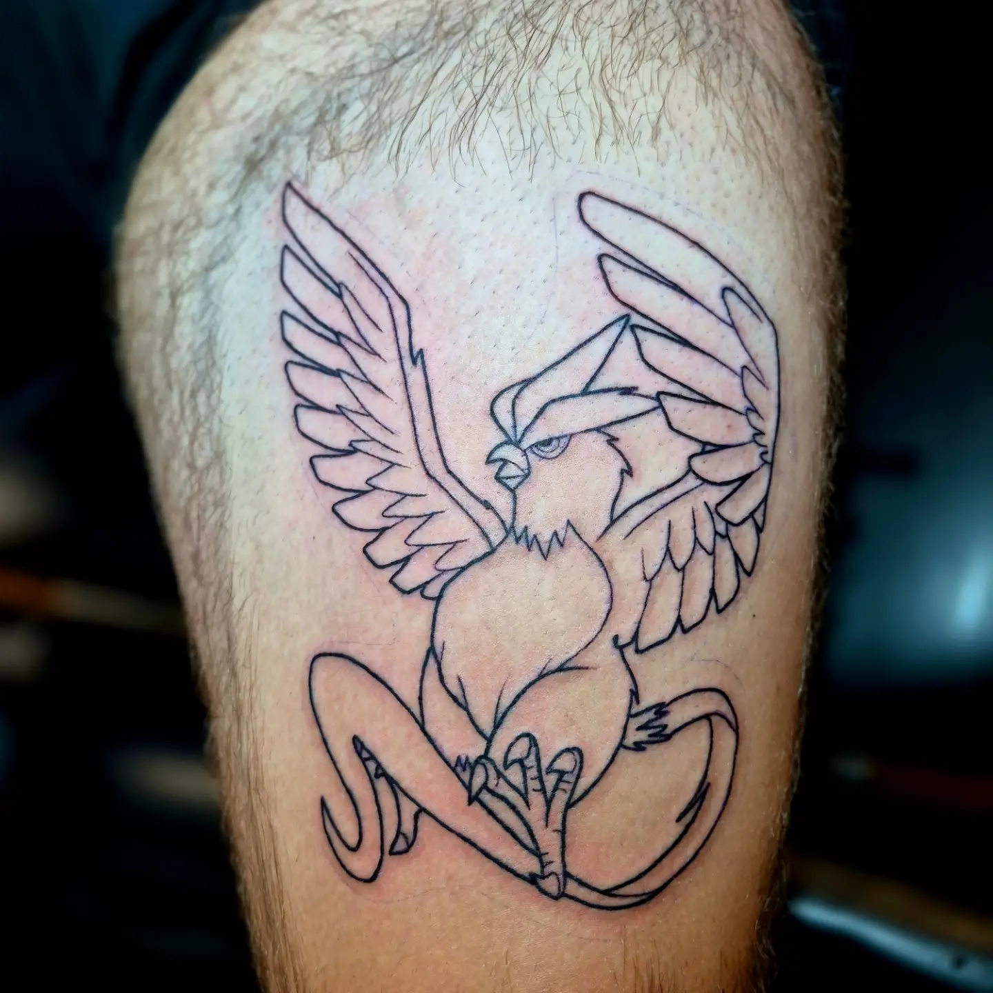 Phoenix black and grey tattoo on the thigh by Bobby H