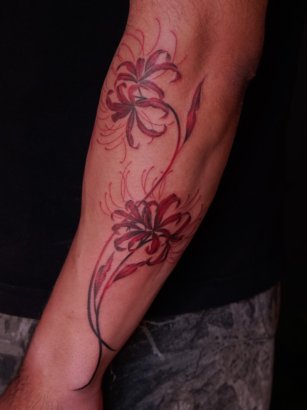 Chrysanthemum watercolor tattoo on the forearm by Nicki Yến