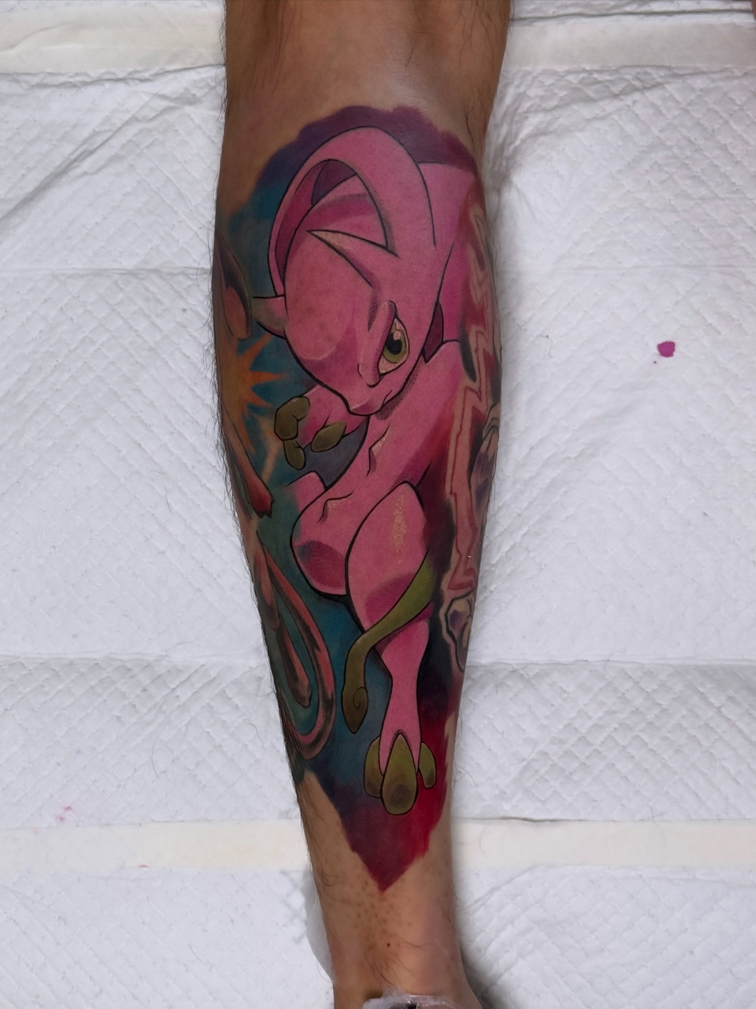 Mewtwo anime tattoo on the forearm by Derek Foferek, Charlotte, North Carolina
