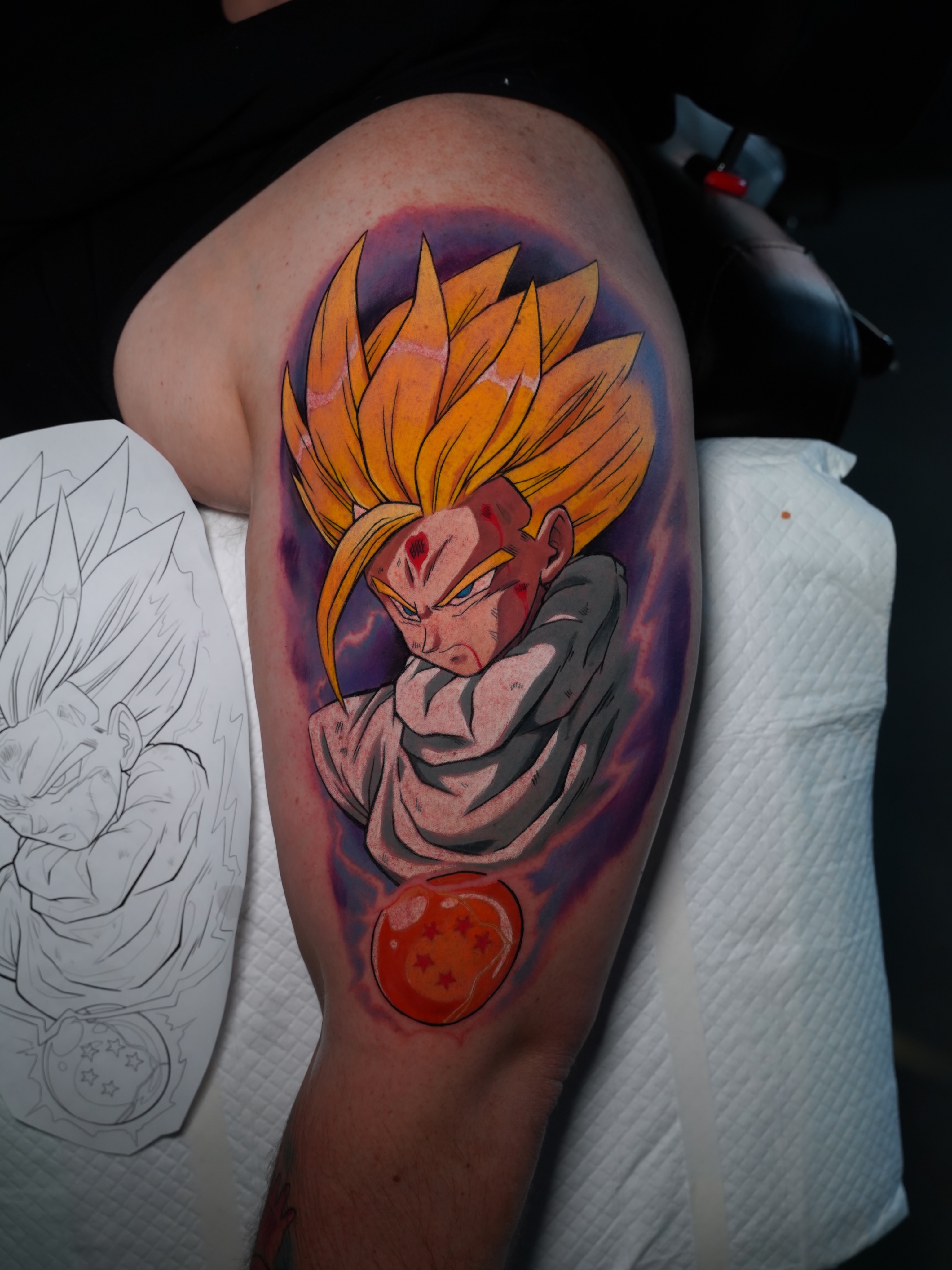 Super saiyan anime tattoo on the thigh by Derek Foferek, Charlotte, North Carolina