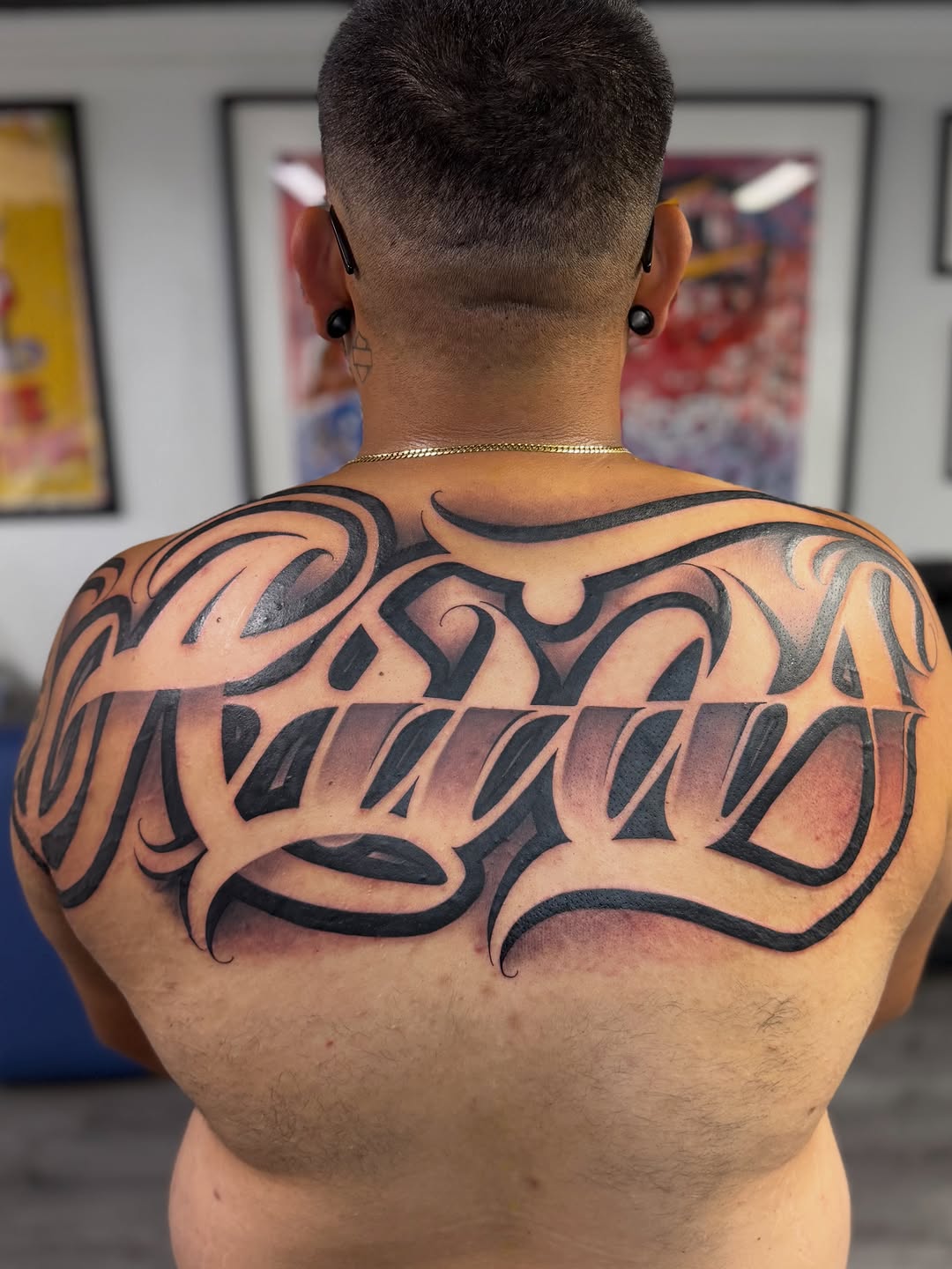 Tattoo by @rockyg_inkz — lettering_script, chicano