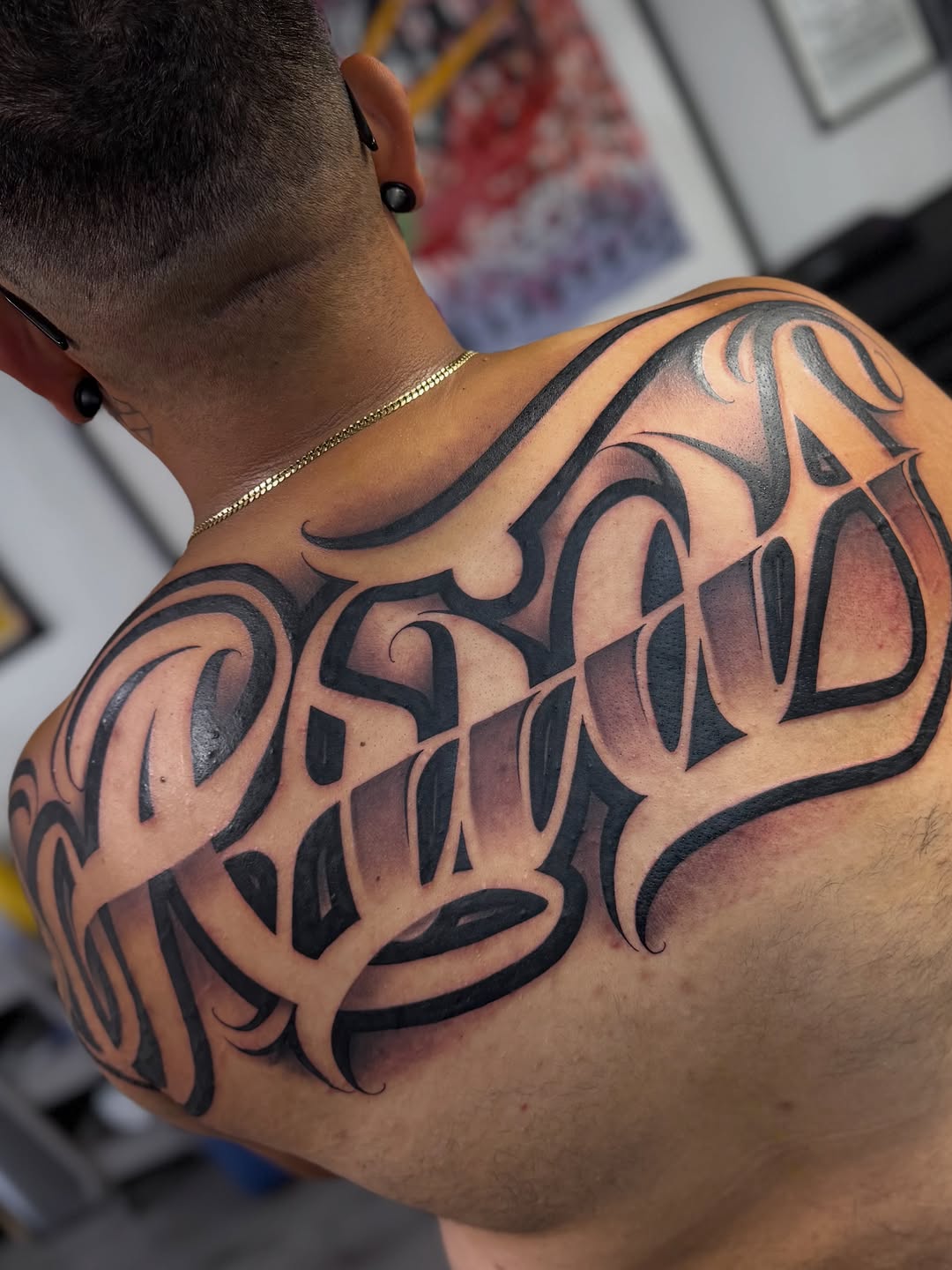 Tattoo by @rockyg_inkz — lettering_script, chicano