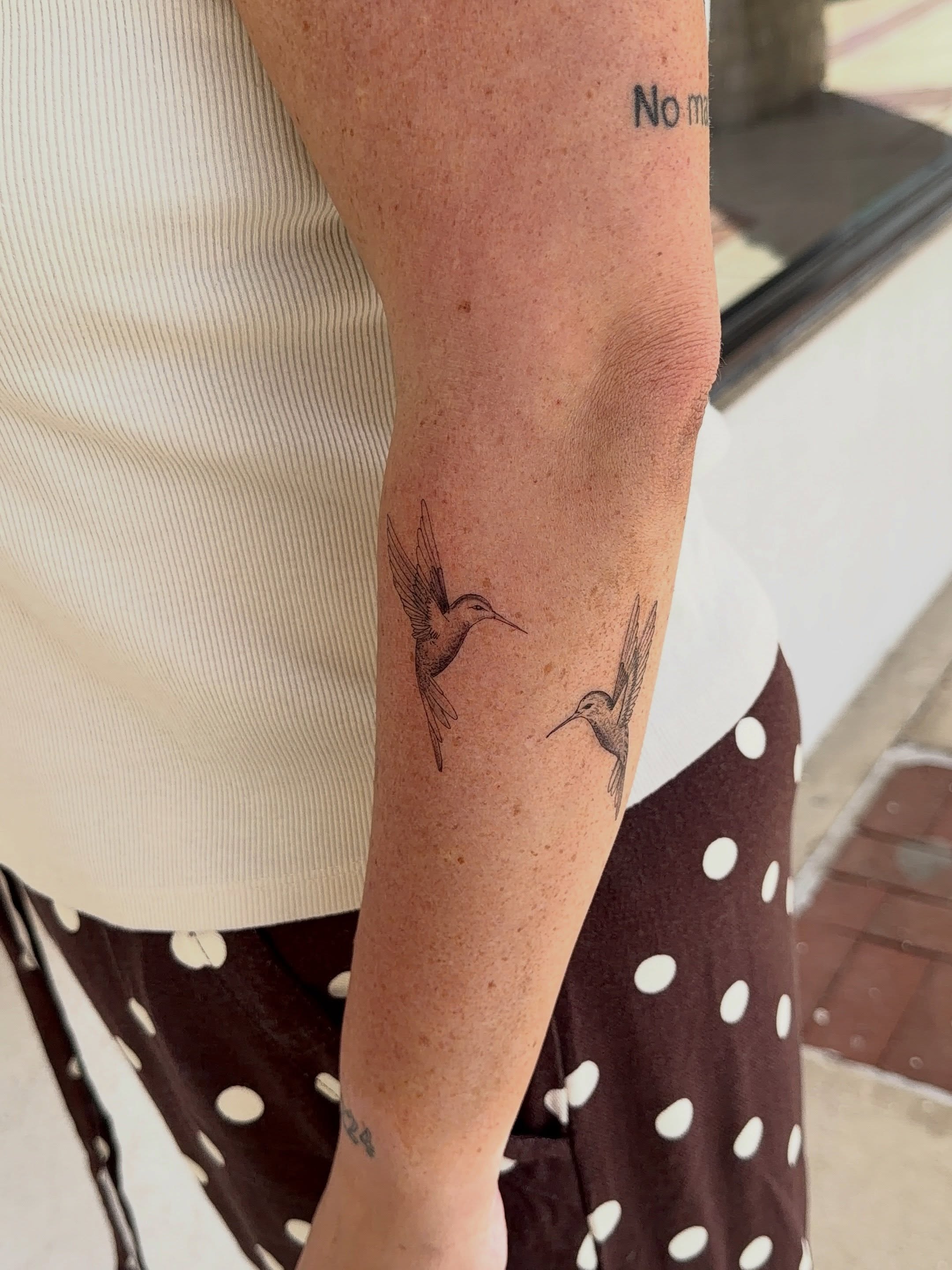 Hummingbirds black and grey tattoo on the forearm by Jacksyn, Plano, Texas