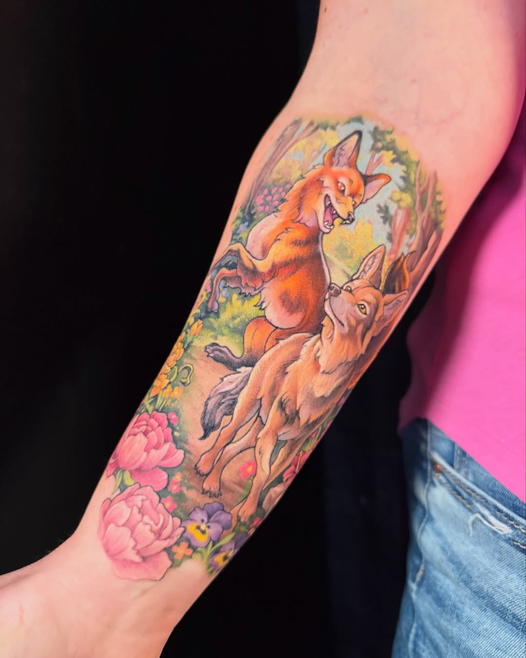 Foxes and flowers realism tattoo on the forearm by Jade Lewis