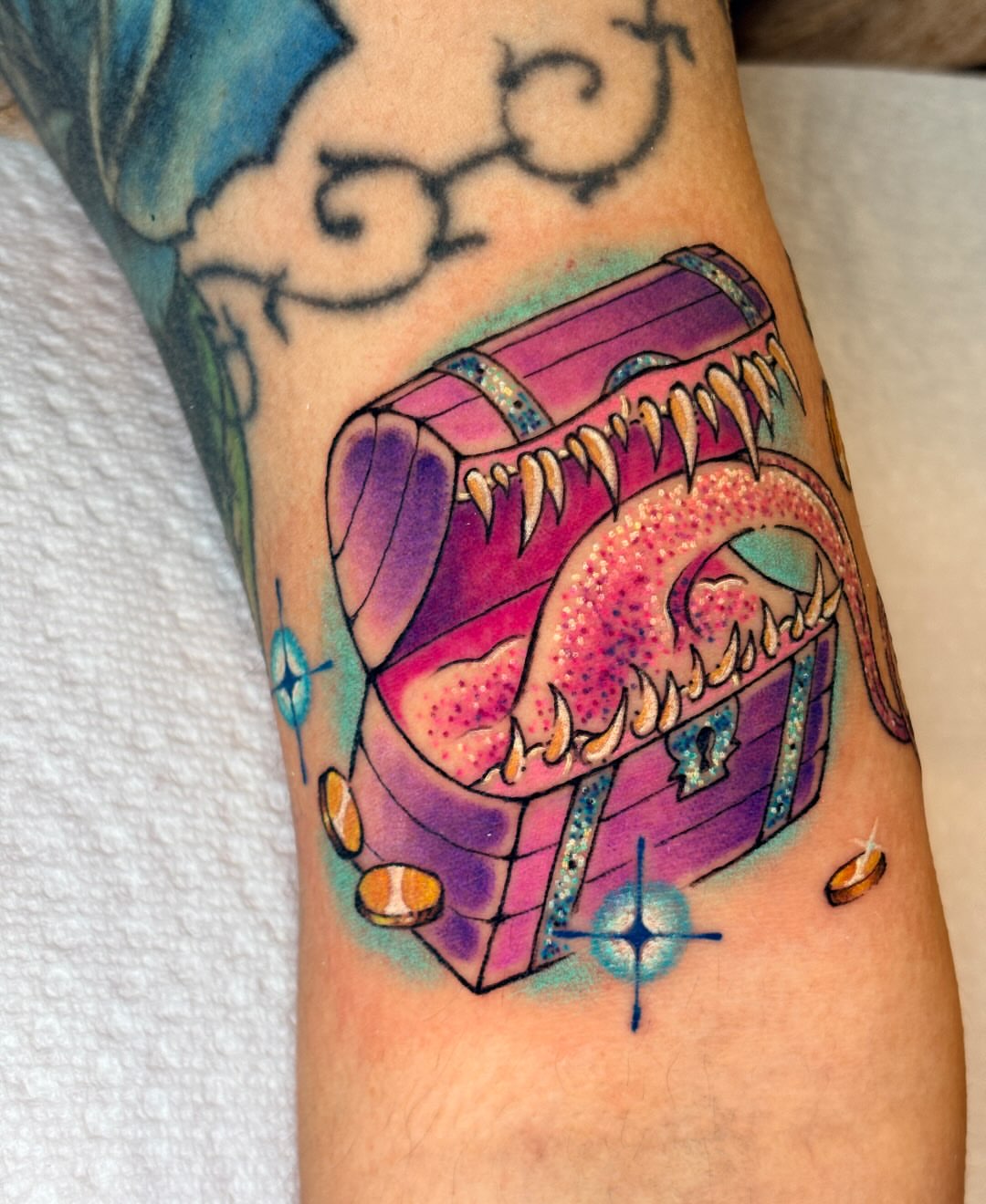 Treasure chest new school tattoo on the forearm by jo, Wichita, Kansas