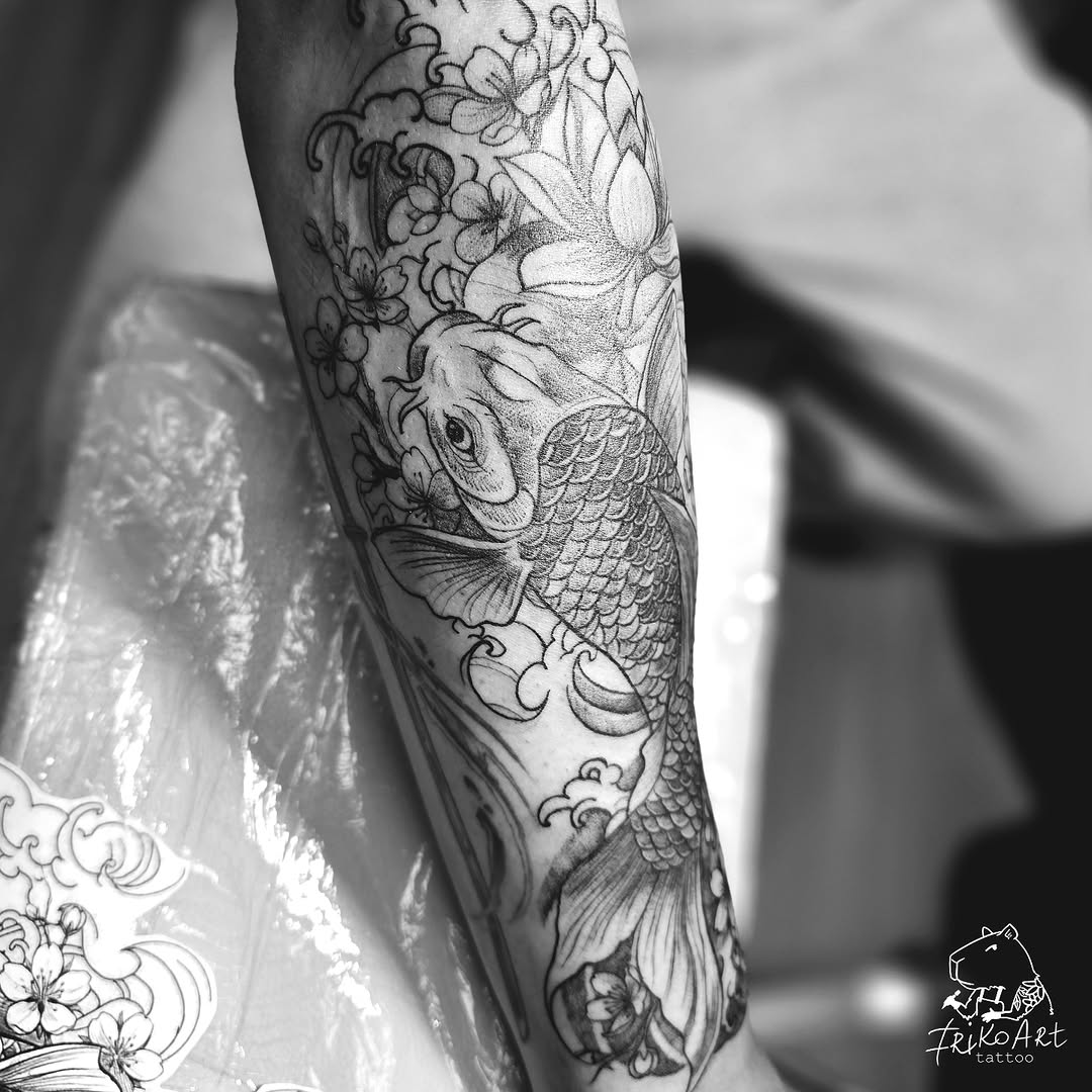 Koi fish and flowers Japanese tattoo on the forearm by Irina