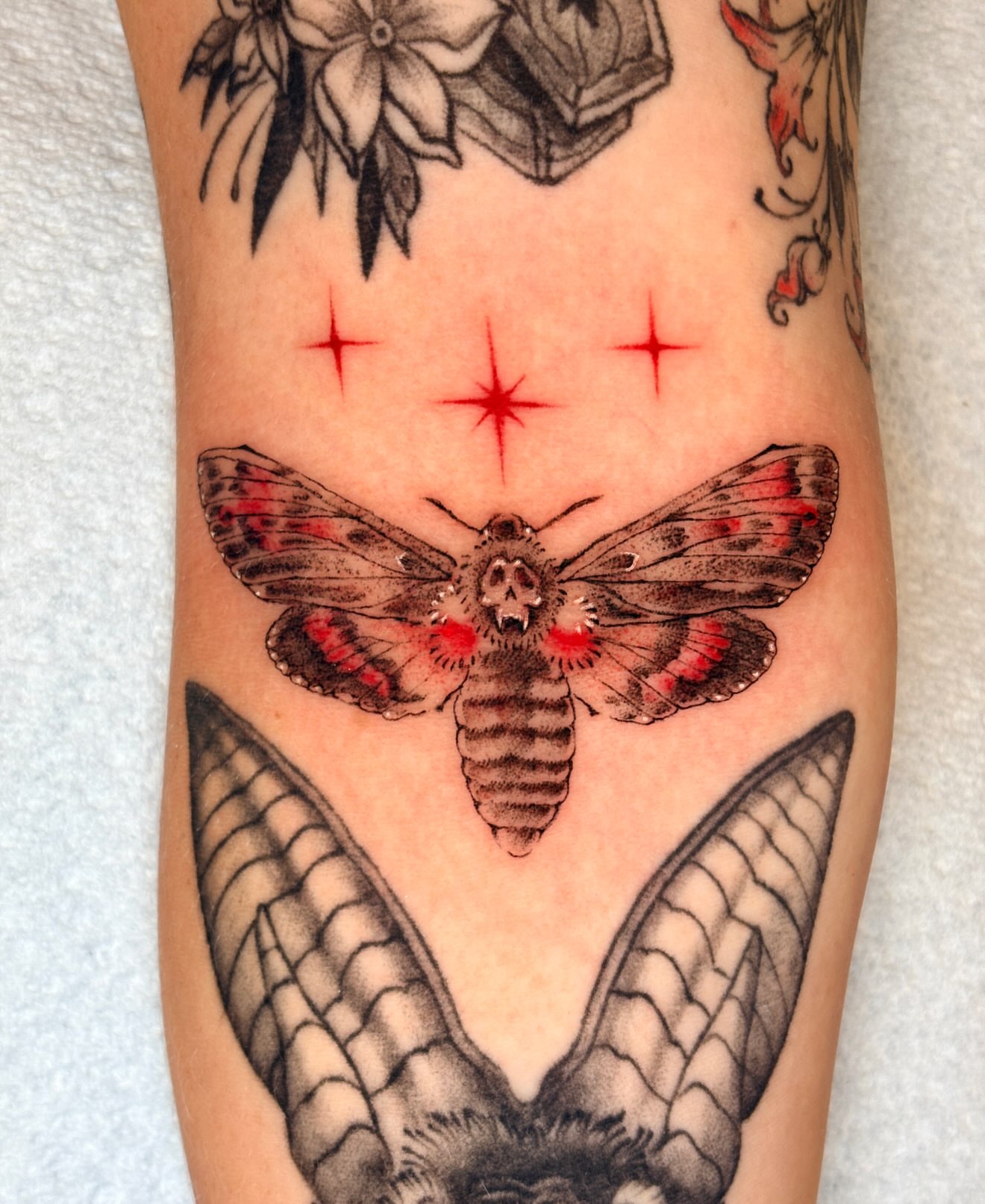 Death's-head hawkmoth American traditional tattoo on the forearm by jo, Wichita, Kansas