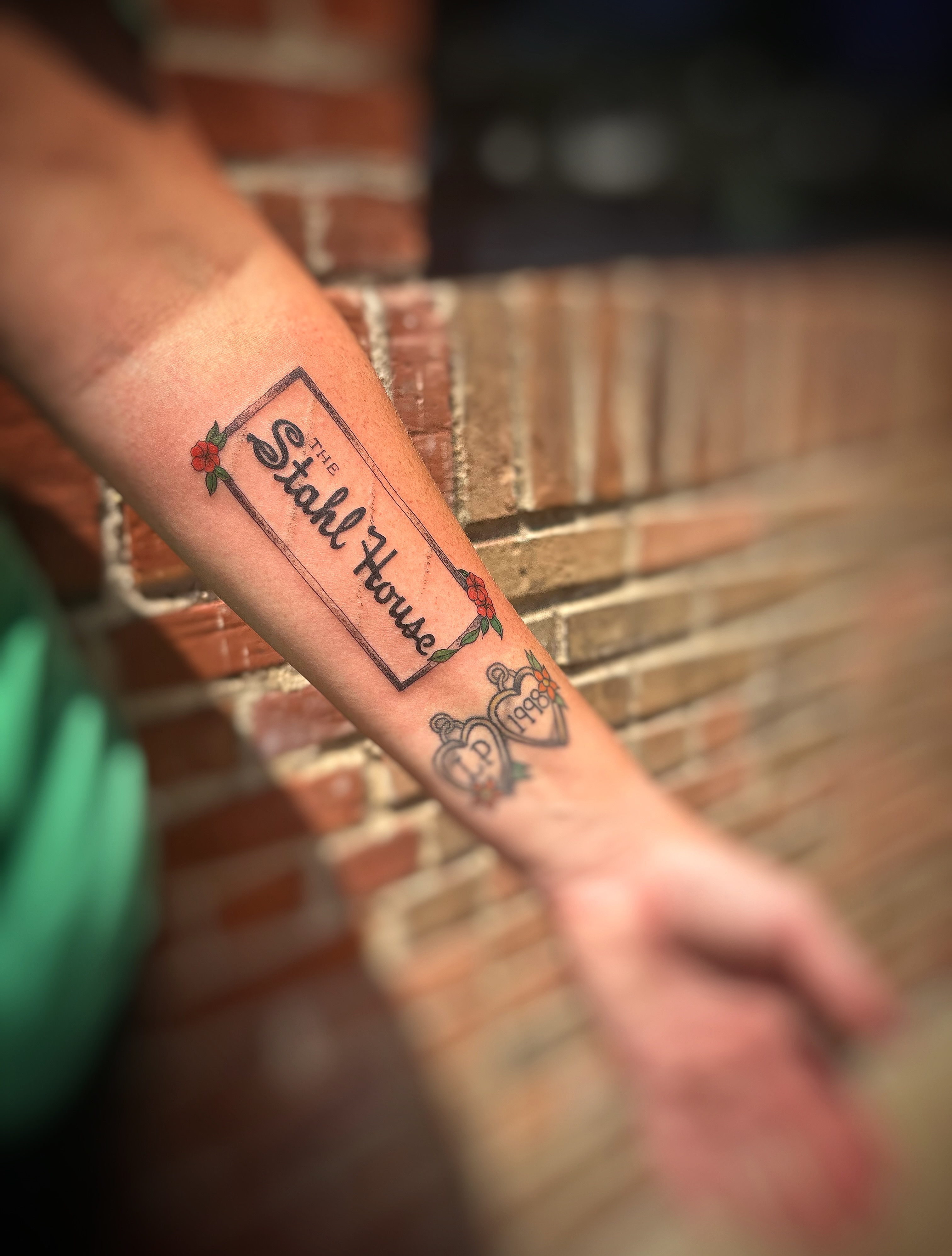 Stahl house American traditional tattoo on the forearm by Holly