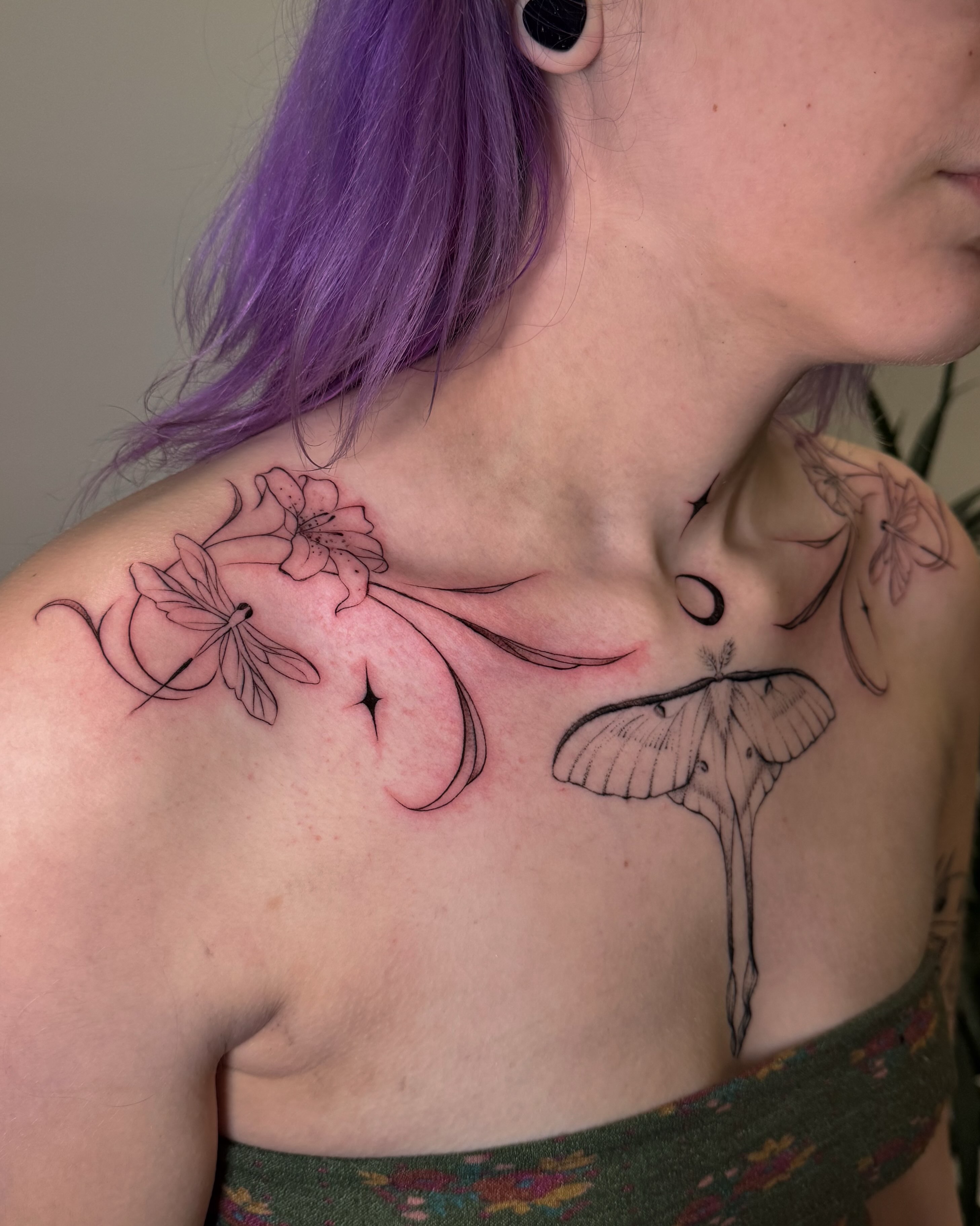 Butterfly and flowers black and grey tattoo on the chest by RyAnn Lynn