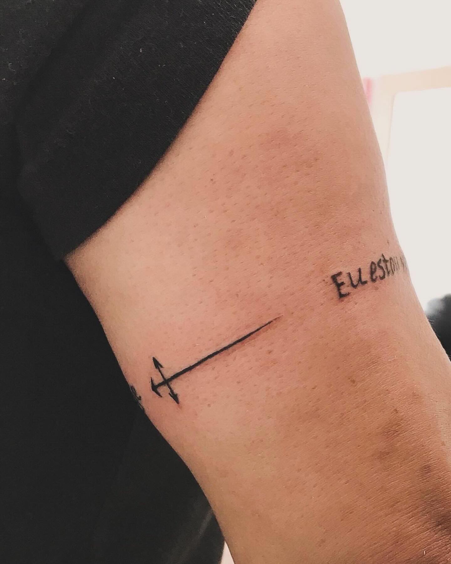 Sagittarius symbol fine line tattoo on the forearm by Yasmine