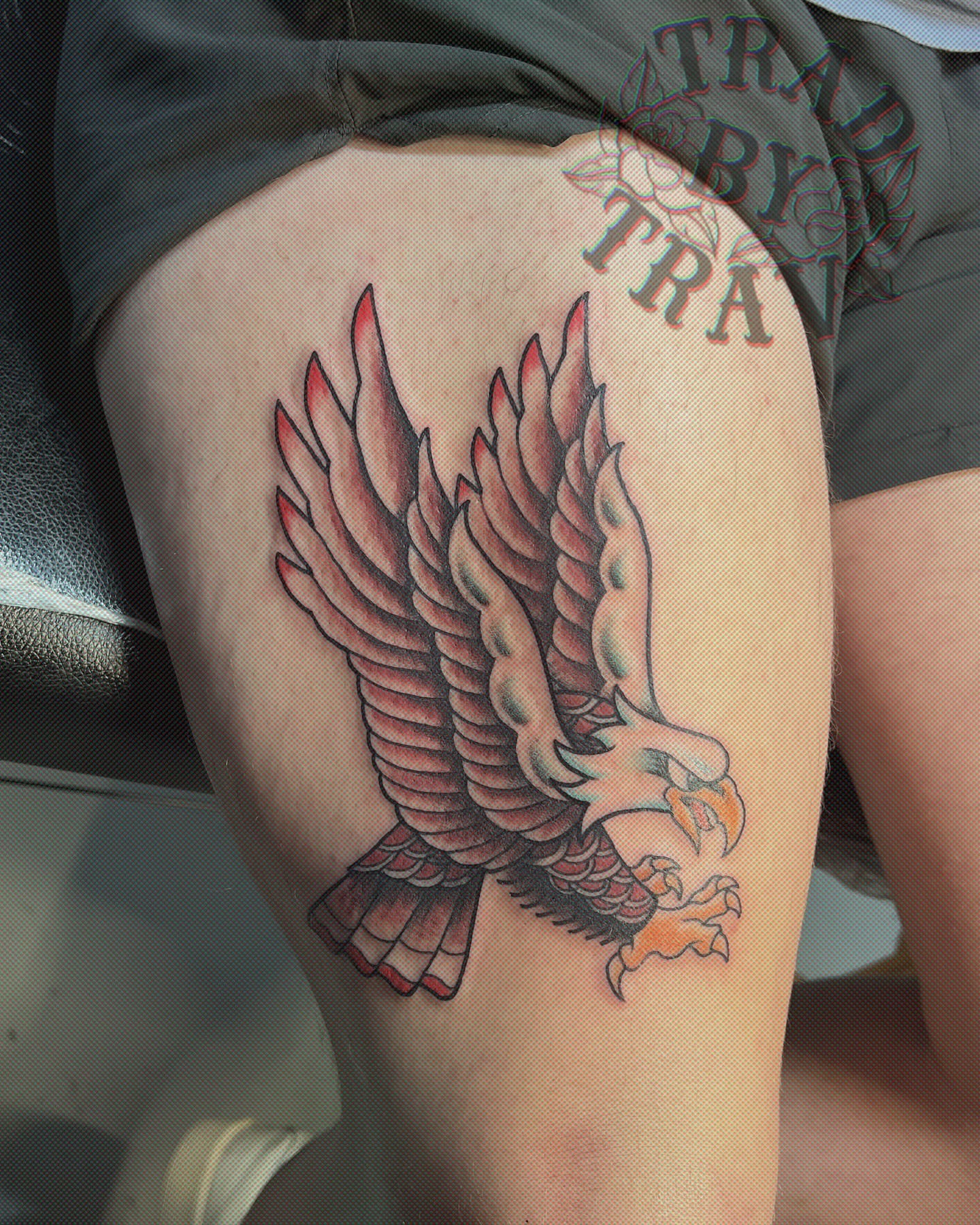Eagle American traditional tattoo on the thigh by Travis B