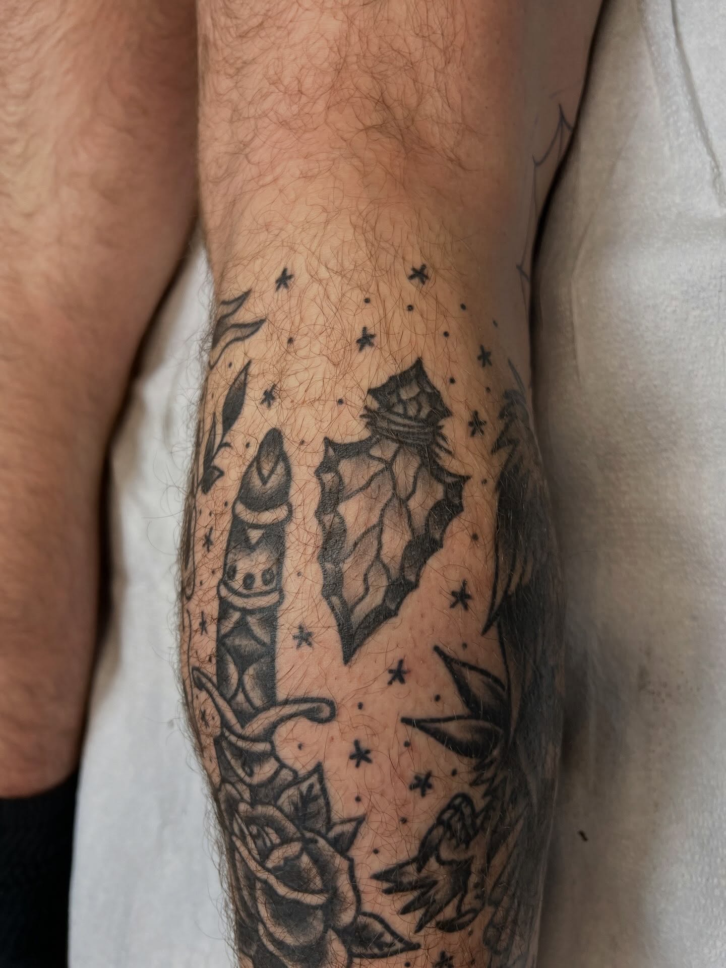 Rocket and leaves American traditional tattoo on the forearm by Tyler Van Pelt