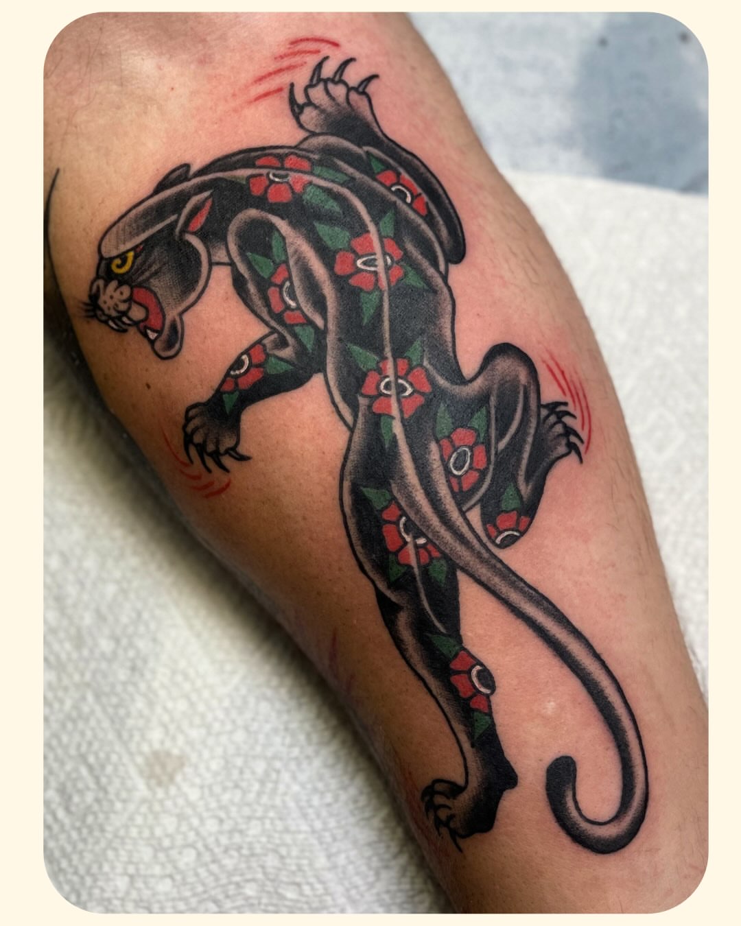Panther with floral patterns American traditional tattoo on the forearm by 𝐒𝐚𝐦𝐬𝐨𝐧𝐋𝐚𝐳𝐚𝐫𝐭𝐞