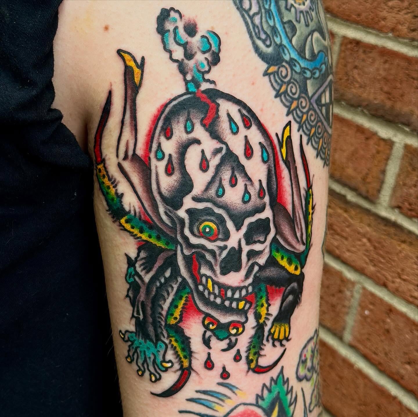 Skull with horns American traditional tattoo on the forearm by Jared Allen, Saint Petersburg, Florida