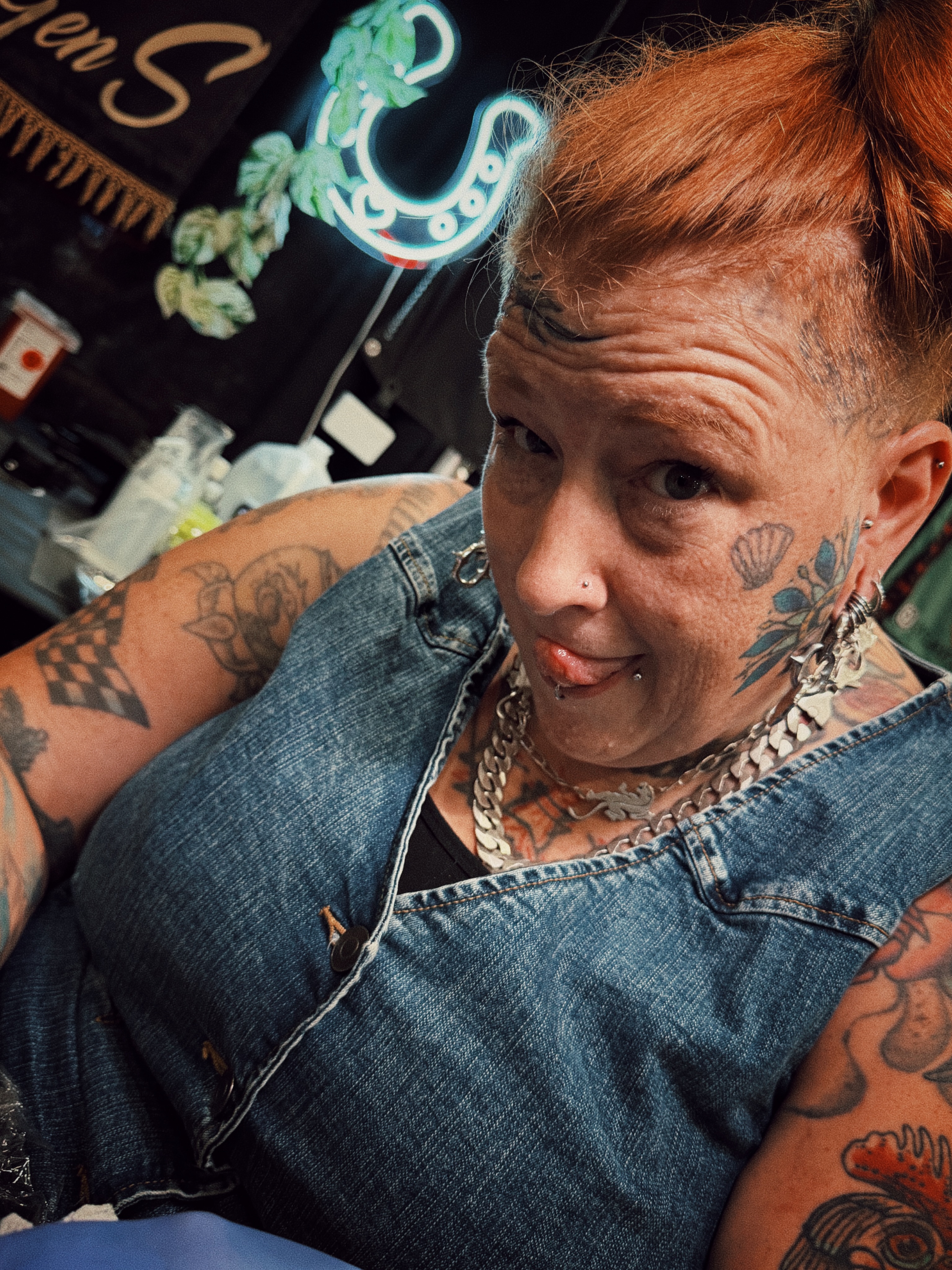 Tattooed face American traditional tattoo by Dustie Pitstick