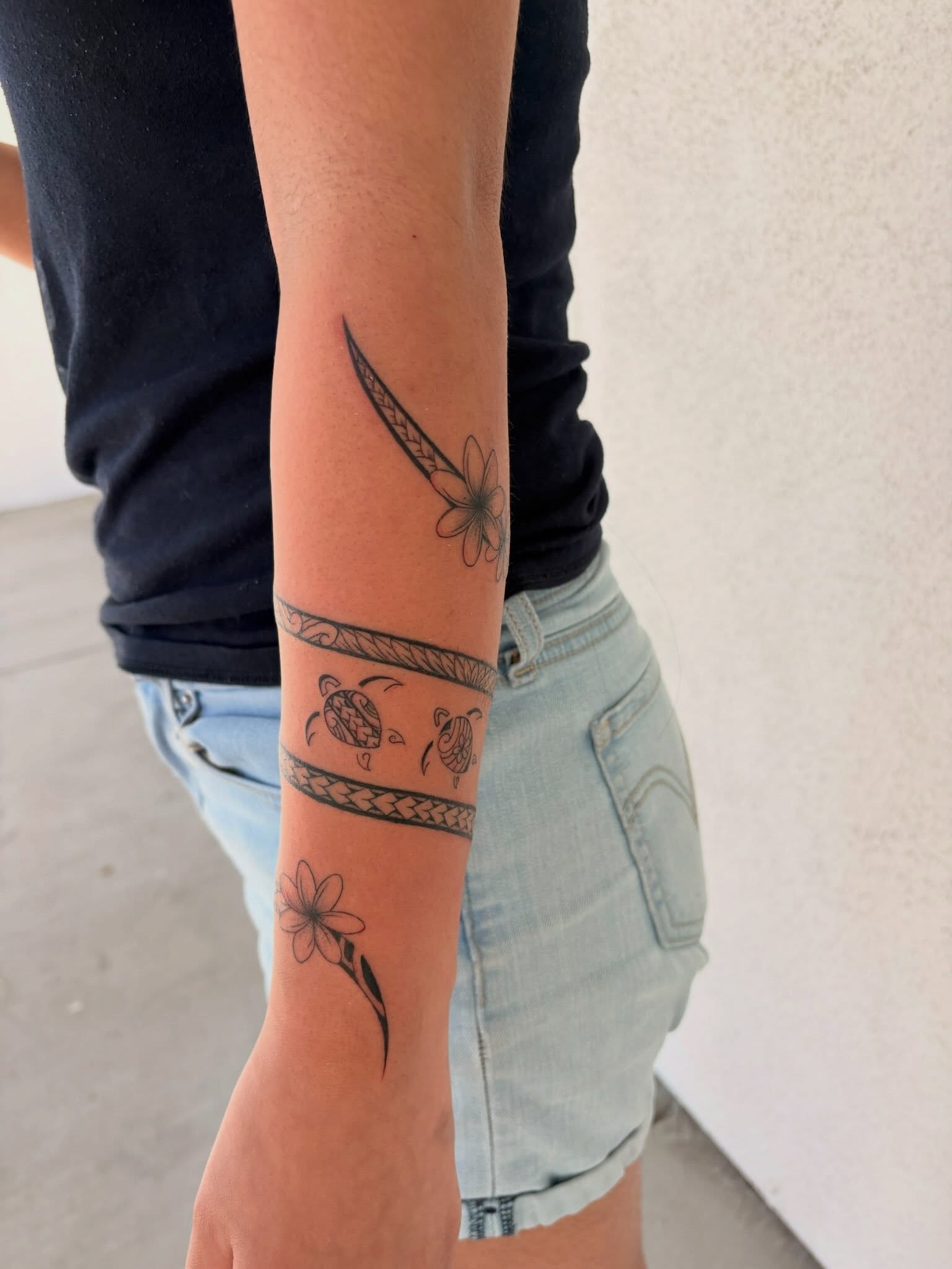 Floral and turtle motifs geometric tattoo on the forearm by tati 🇬🇺🇵🇭