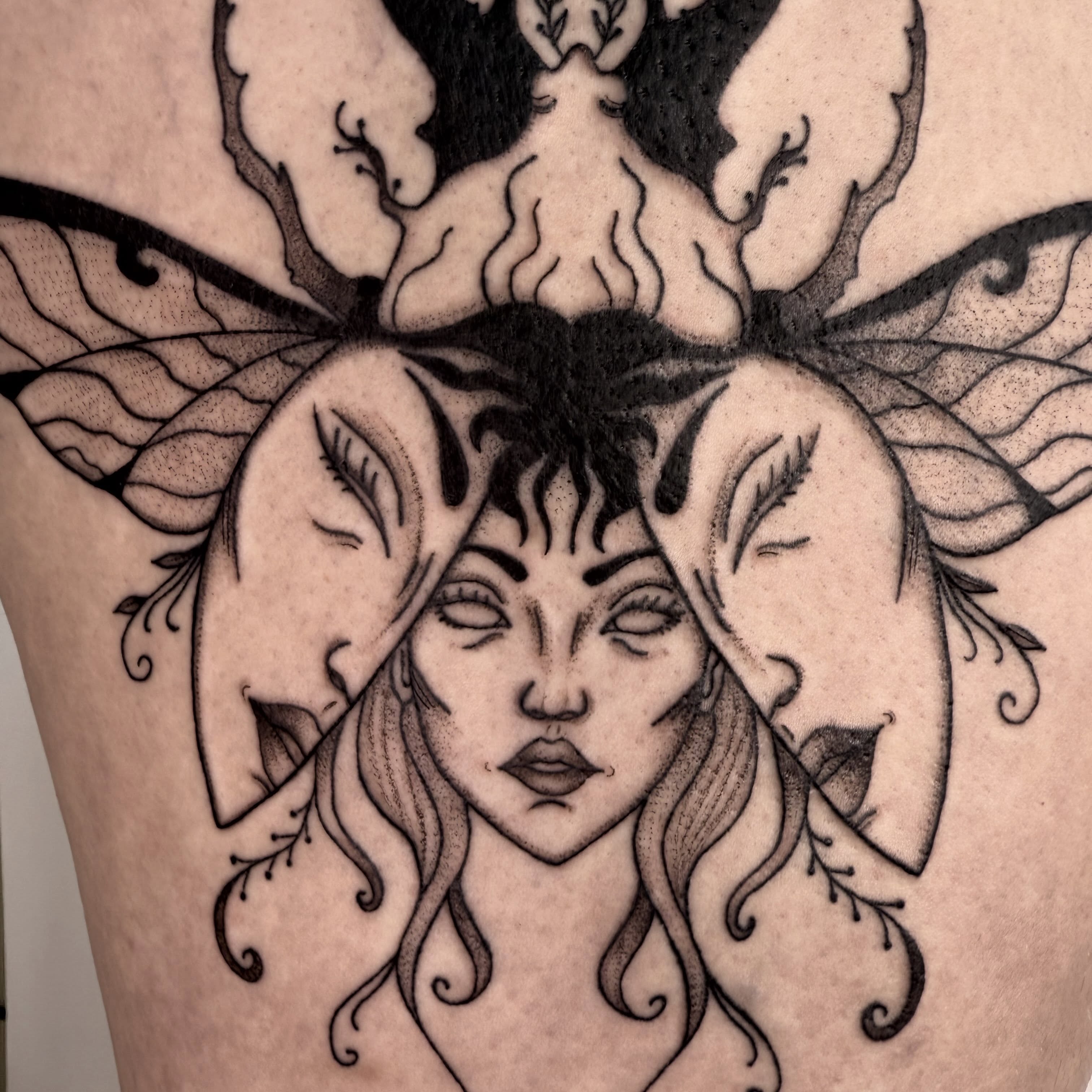 Woman with wings realism tattoo on the thigh by Nika