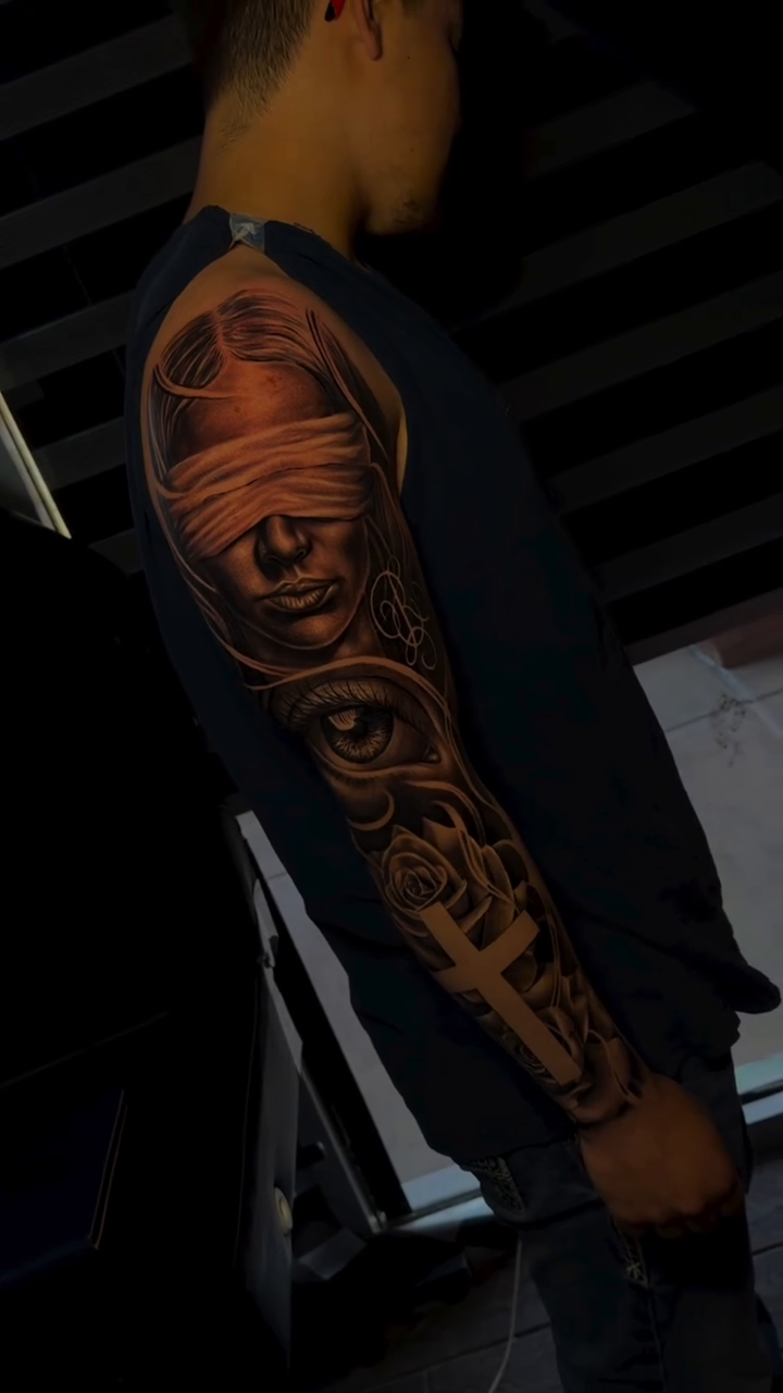 Tattoo by @thesantanaink — dark_realism, black_and_grey