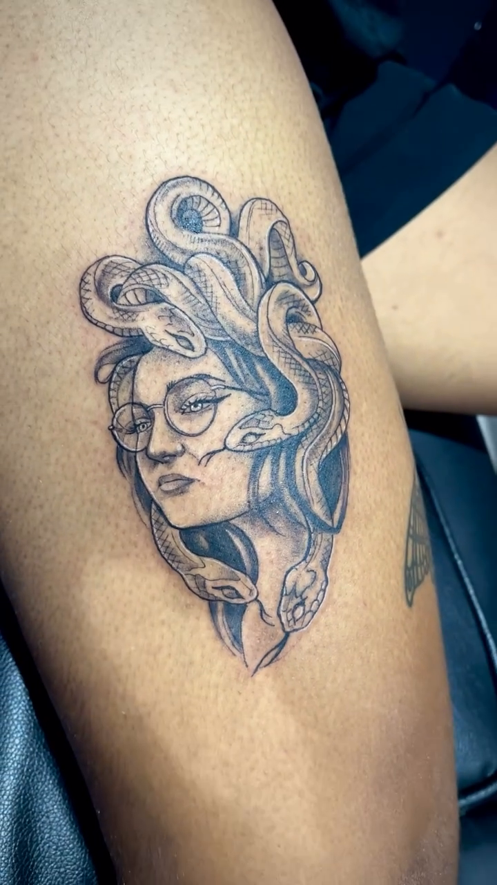 Tattoo by @inknpaint.society β black_and_grey, realism