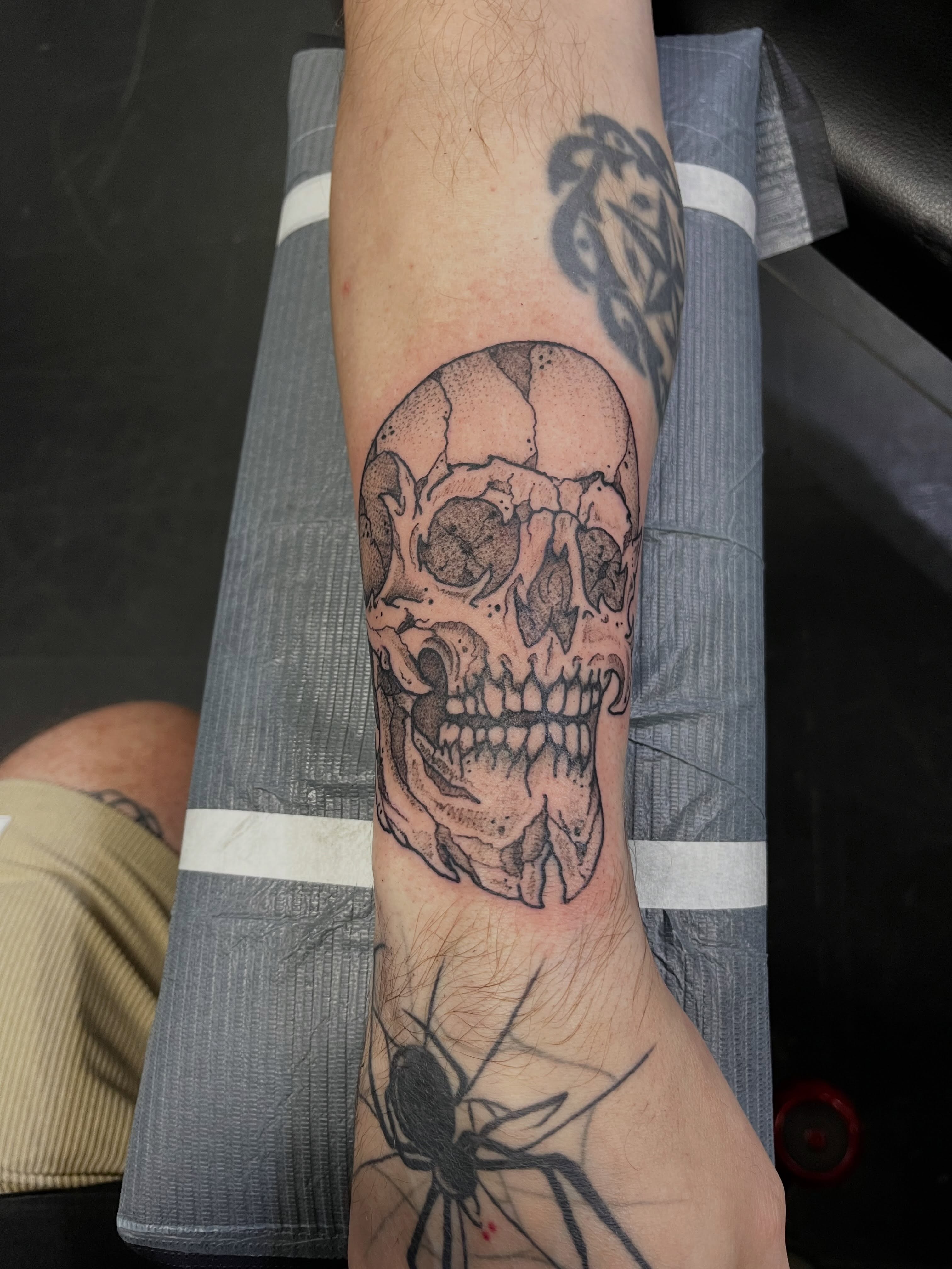 Skull dotwork tattoo on the forearm by CRAIG B⛓️ Cincinnati Tattoo Artist
