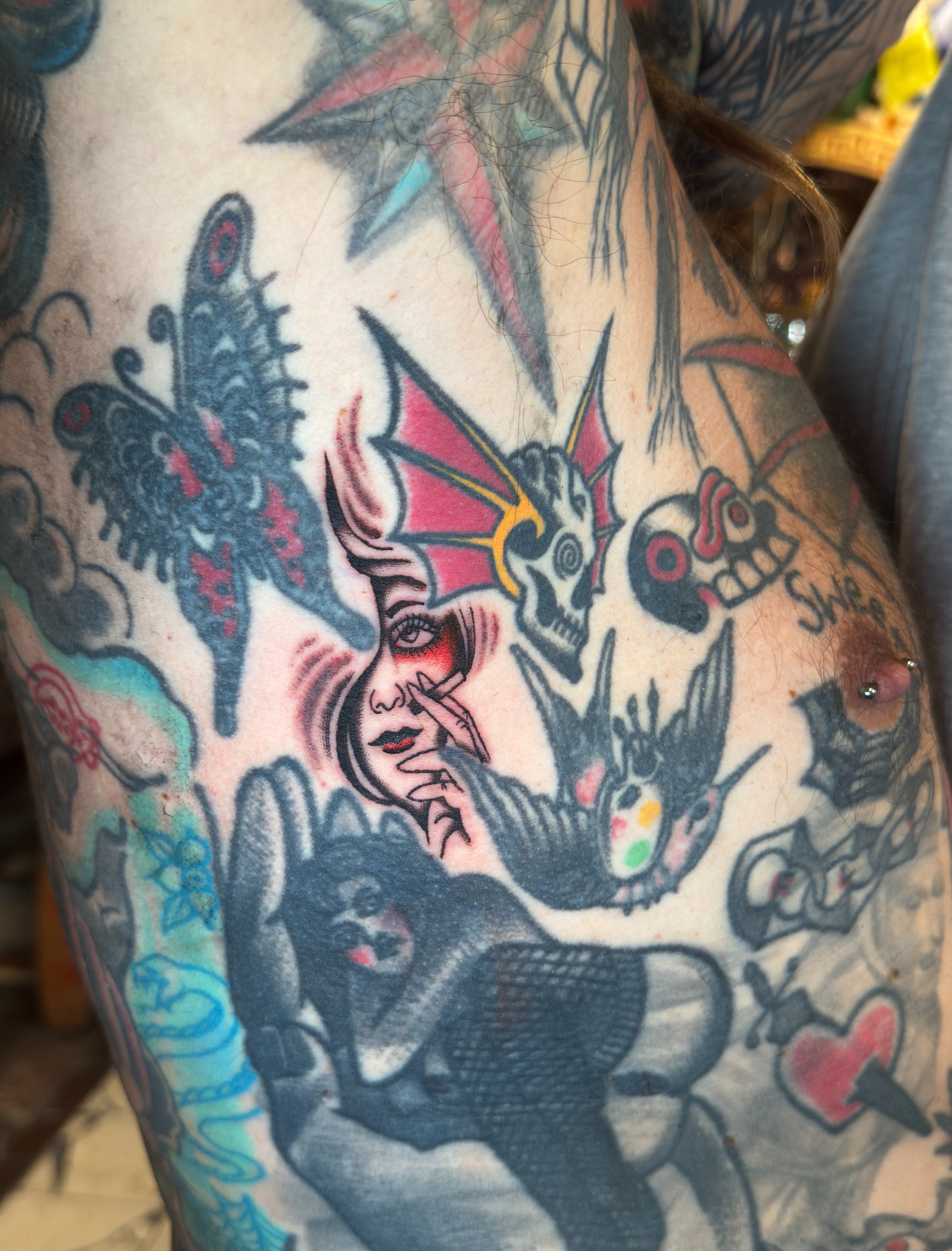 Woman with horns American traditional tattoo on the forearm by Allie Barringer