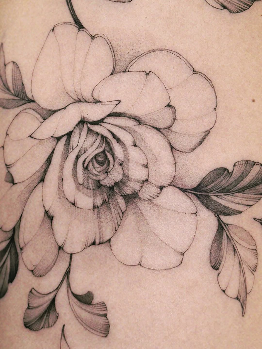 Tattoo by @angel.flow144 — black_and_grey, realism