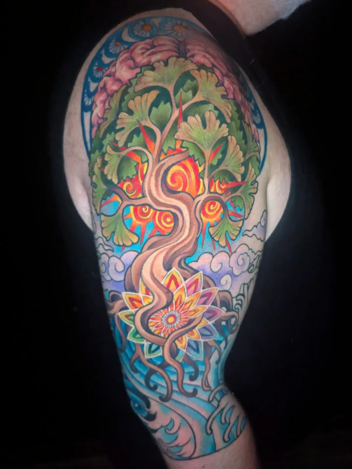 Tree of life new school tattoo on the upper arm by Devon Greig